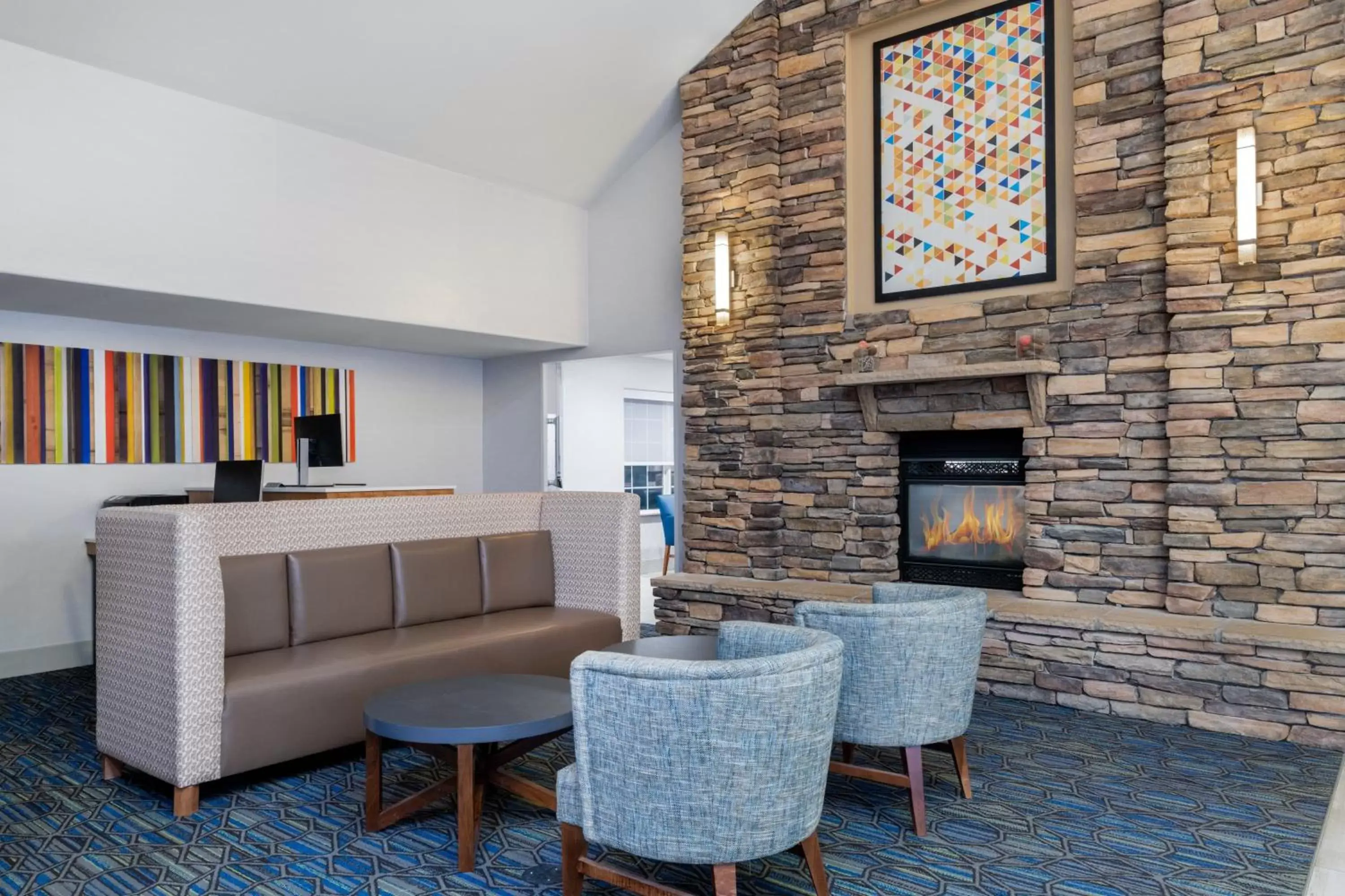Property building, Seating Area in Holiday Inn Express & Suites Wheat Ridge-Denver West, an IHG Hotel