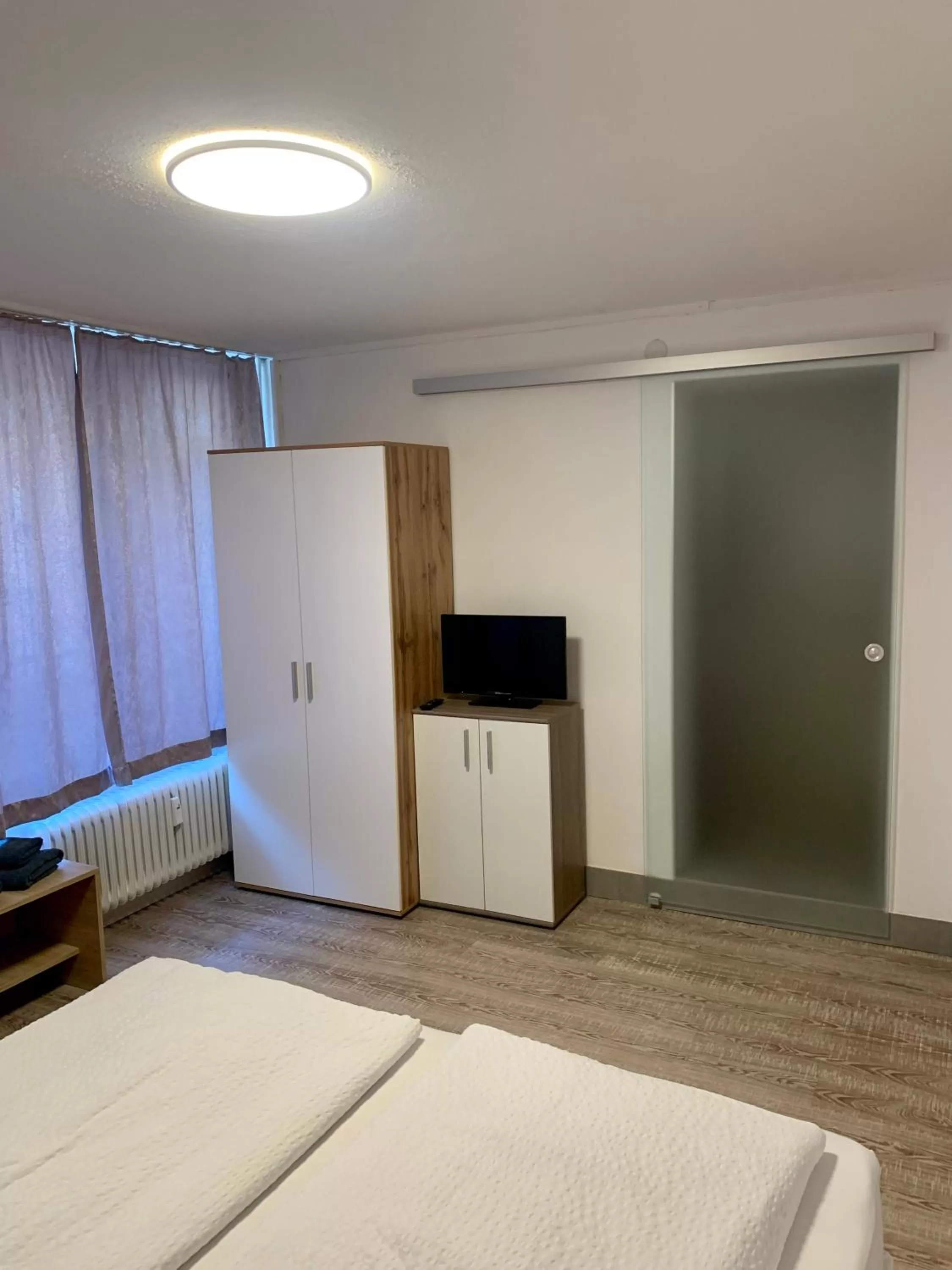 TV and multimedia, Bed in Smart Stay Rooms Feldkirch