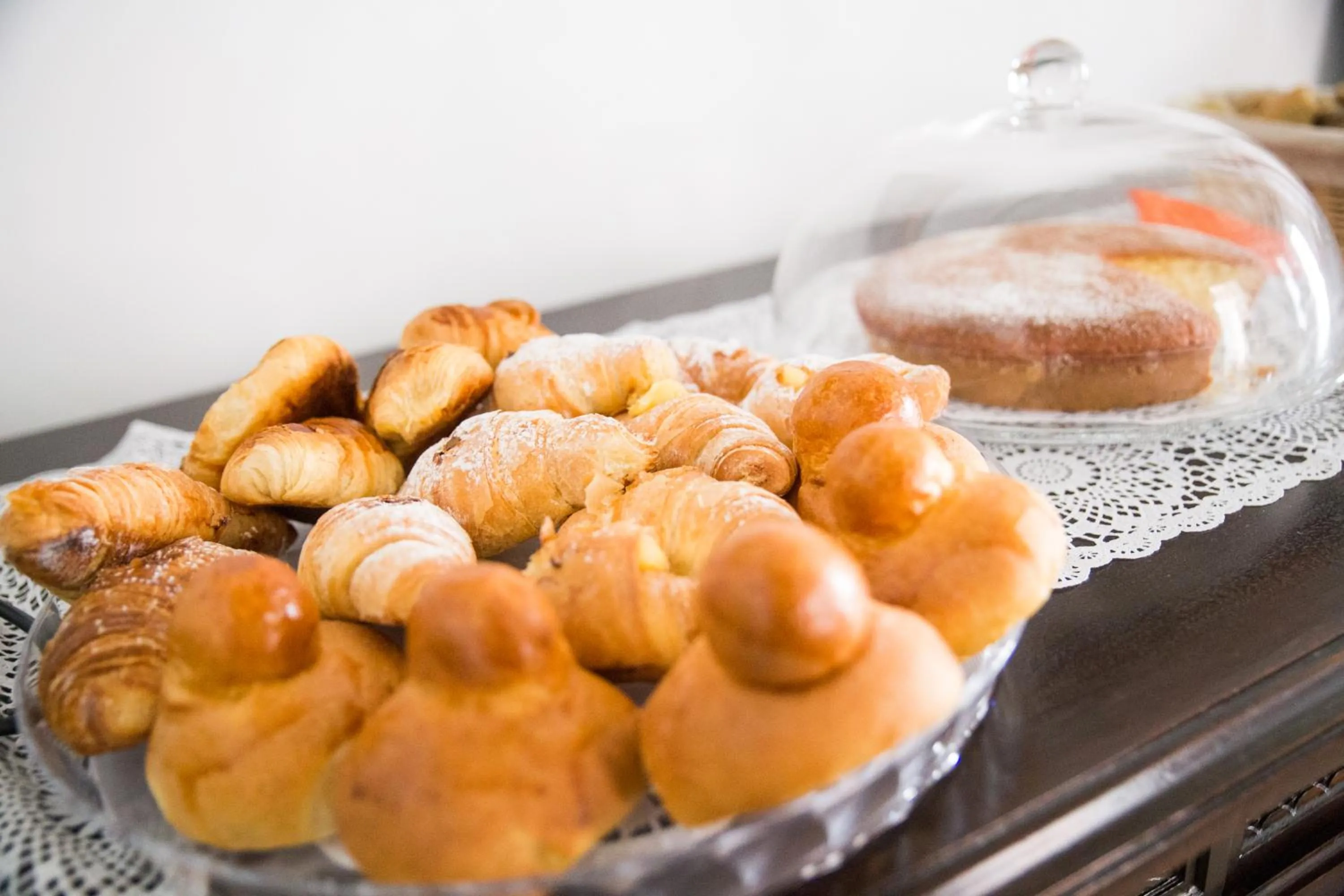 Communal lounge/ TV room in NapoliMia Boutique Hotel