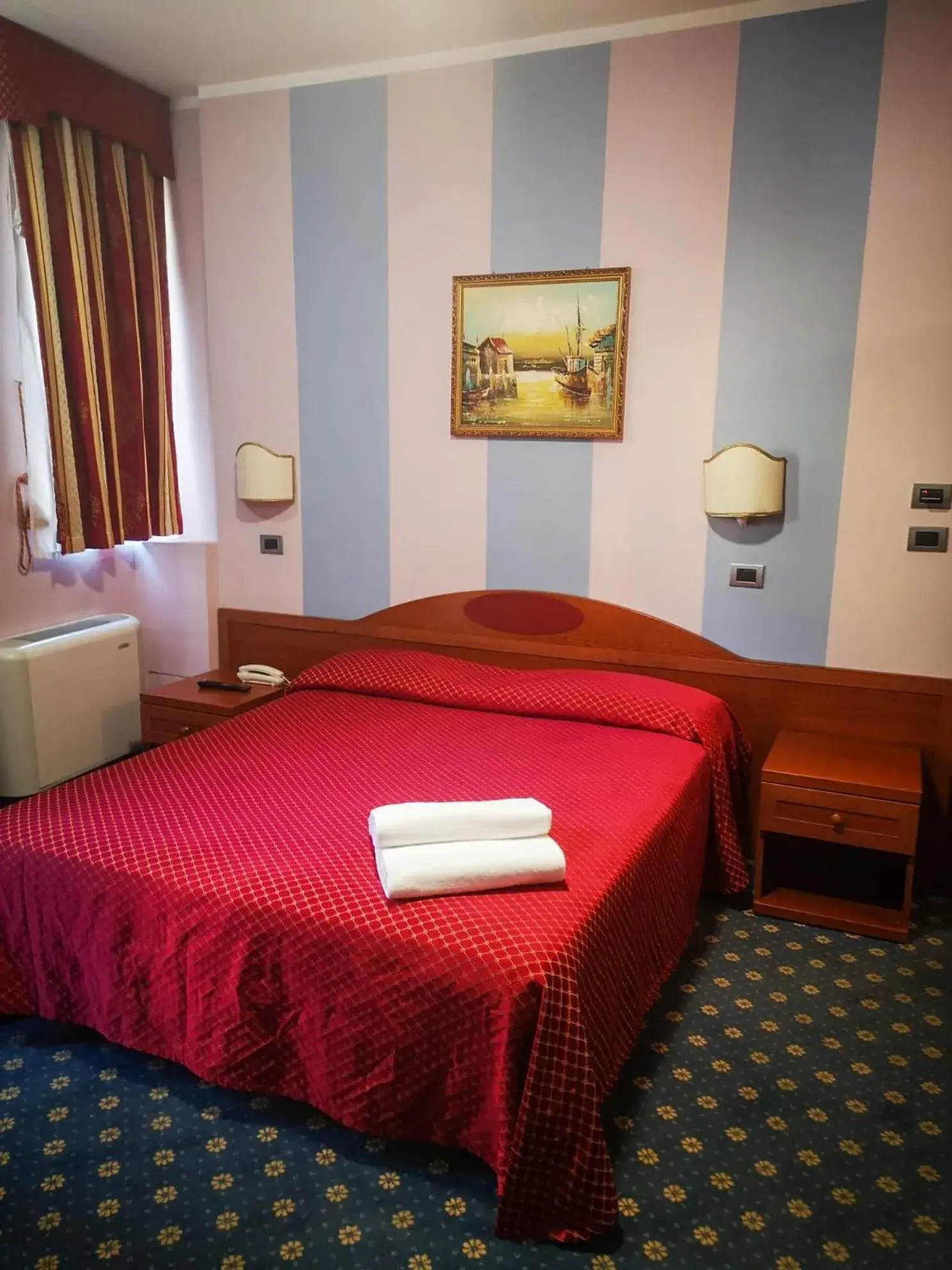 Bed in Hotel Cavour Resort