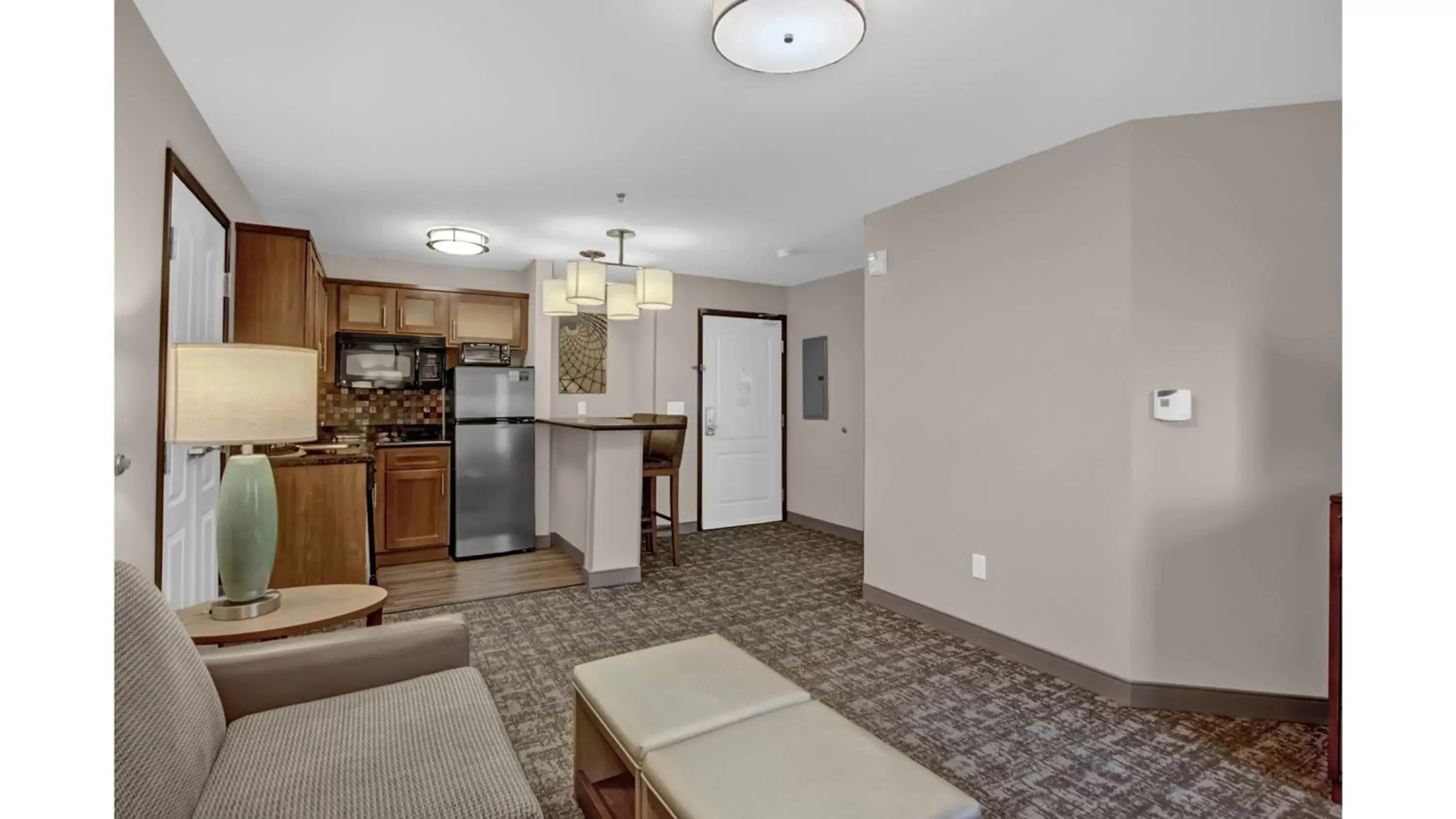 Photo of the whole room, Kitchen/Kitchenette in Staybridge Suites Salt Lake-West Valley City, an IHG Hotel