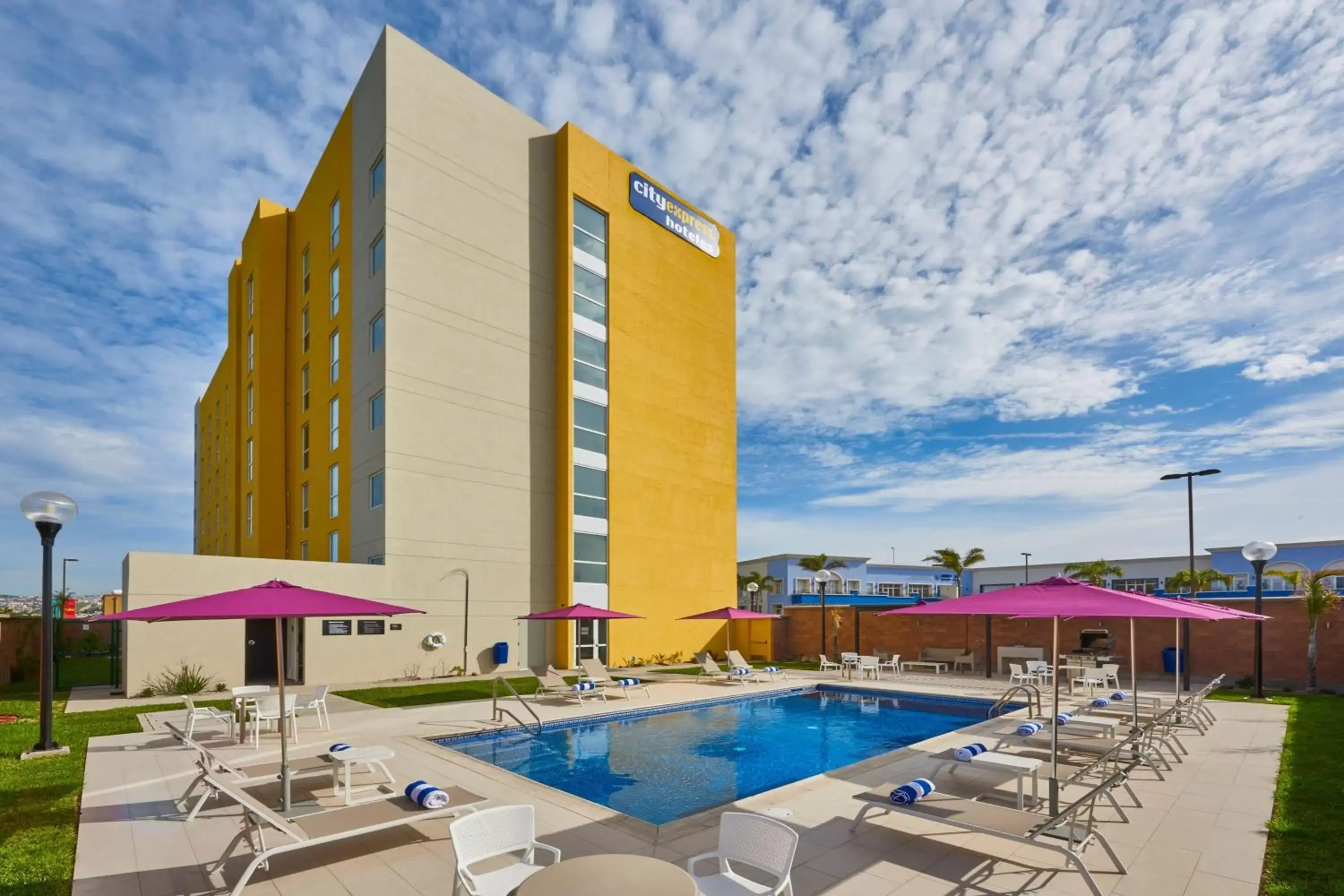 Swimming pool, Property Building in City Express by Marriott Rosarito