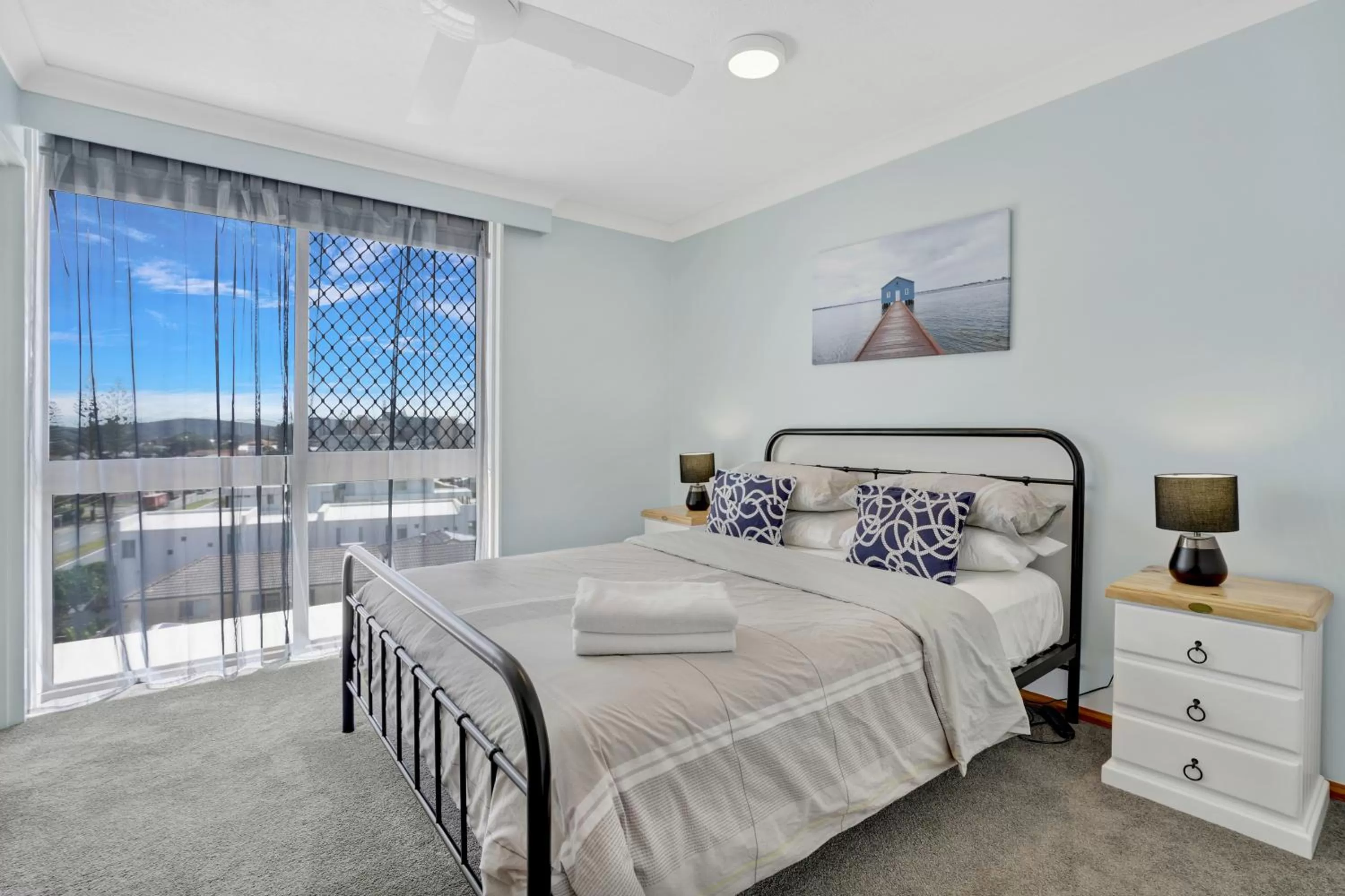 Bed in Beach Palms Holiday Apartments