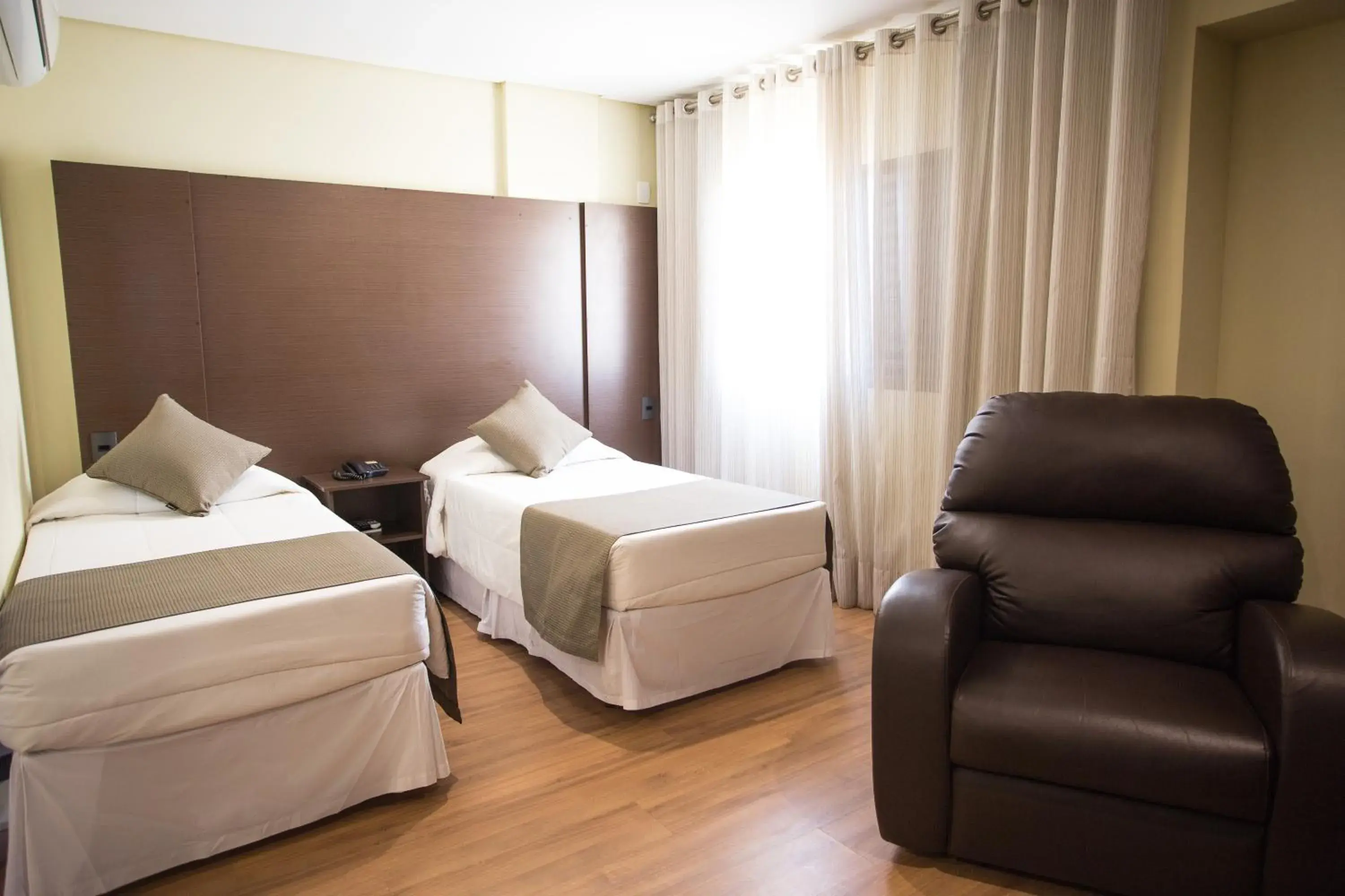 Bed in Olavo Bilac Hotel