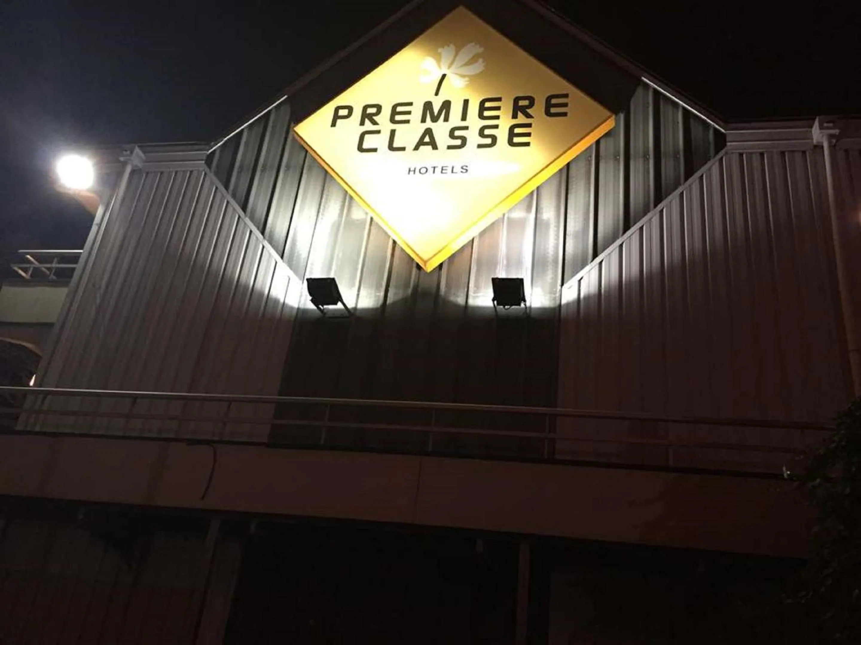 Property logo or sign in Premiere Classe St Etienne Nord Villars