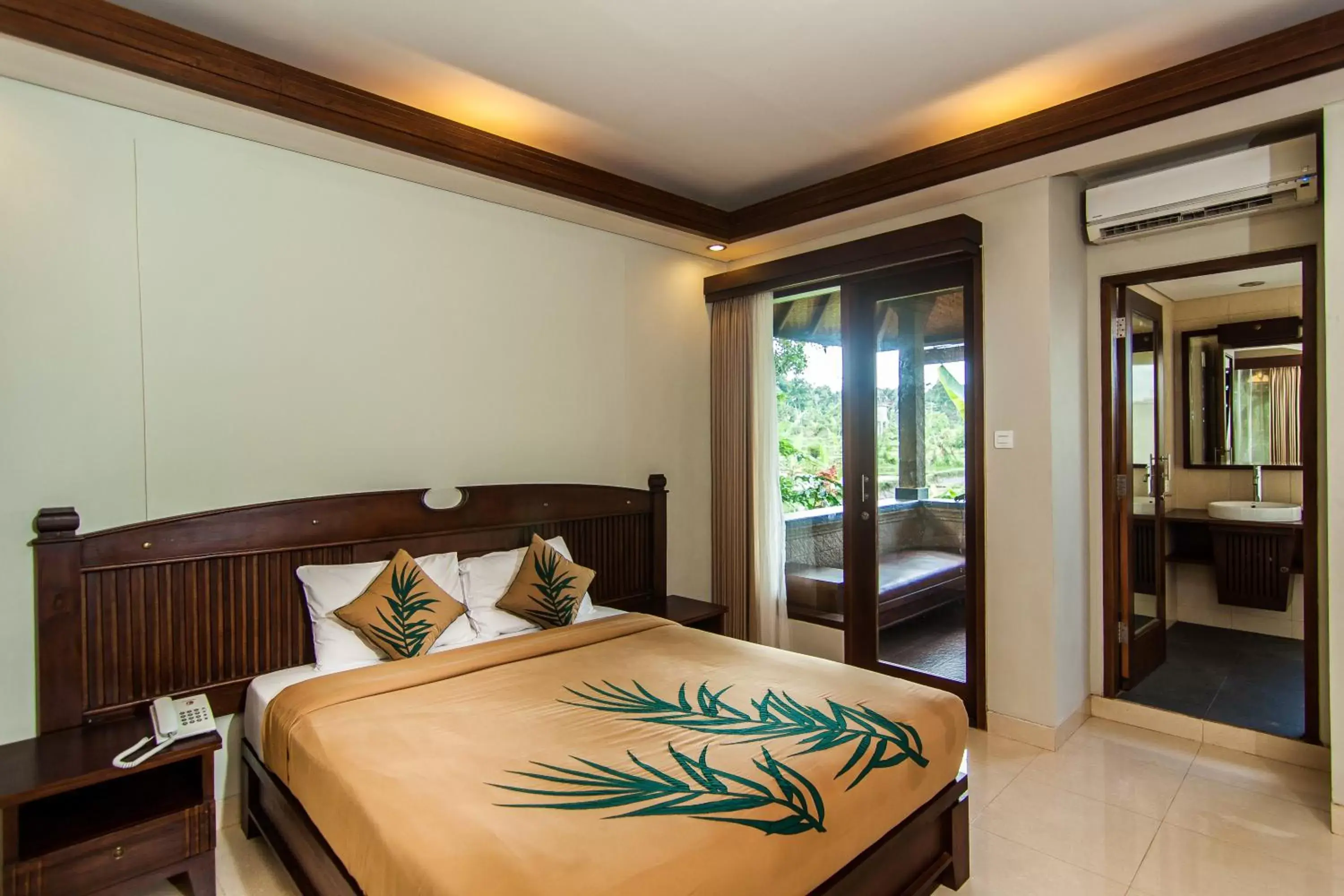 Bed in De Munut Balinese Resort