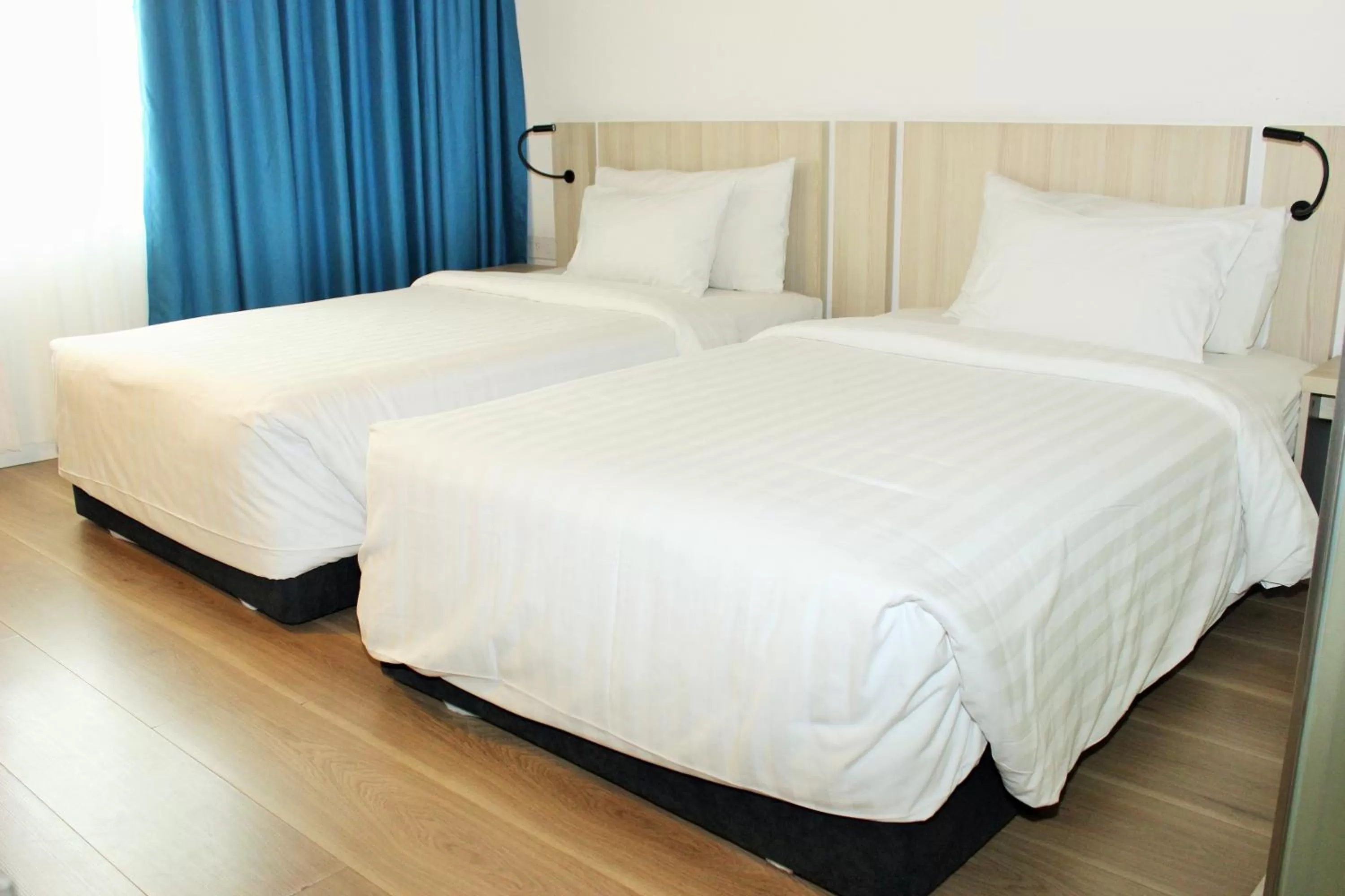 Bed in Liberty Hotel Saigon Greenview