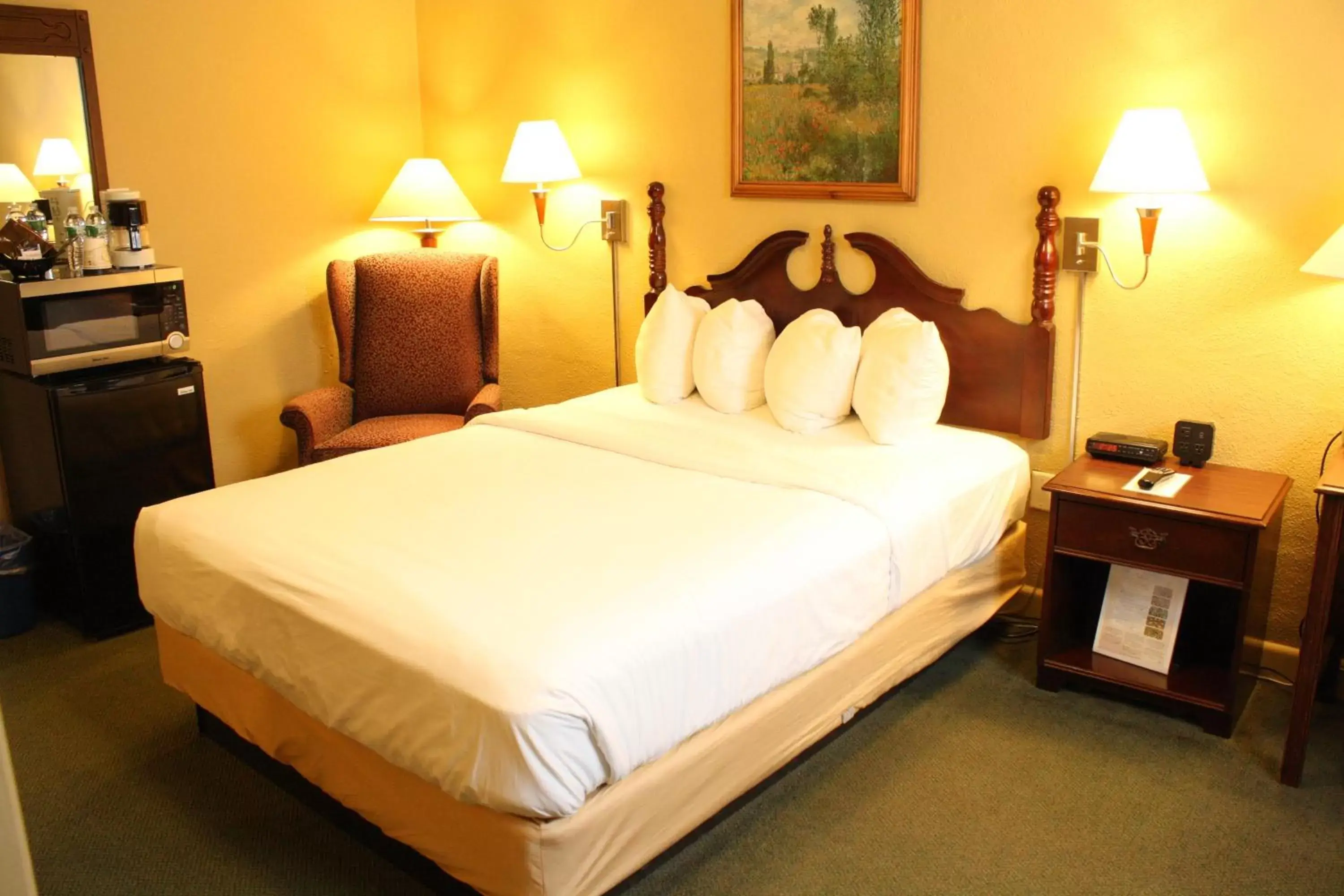 Bed in Senator Inn & Spa