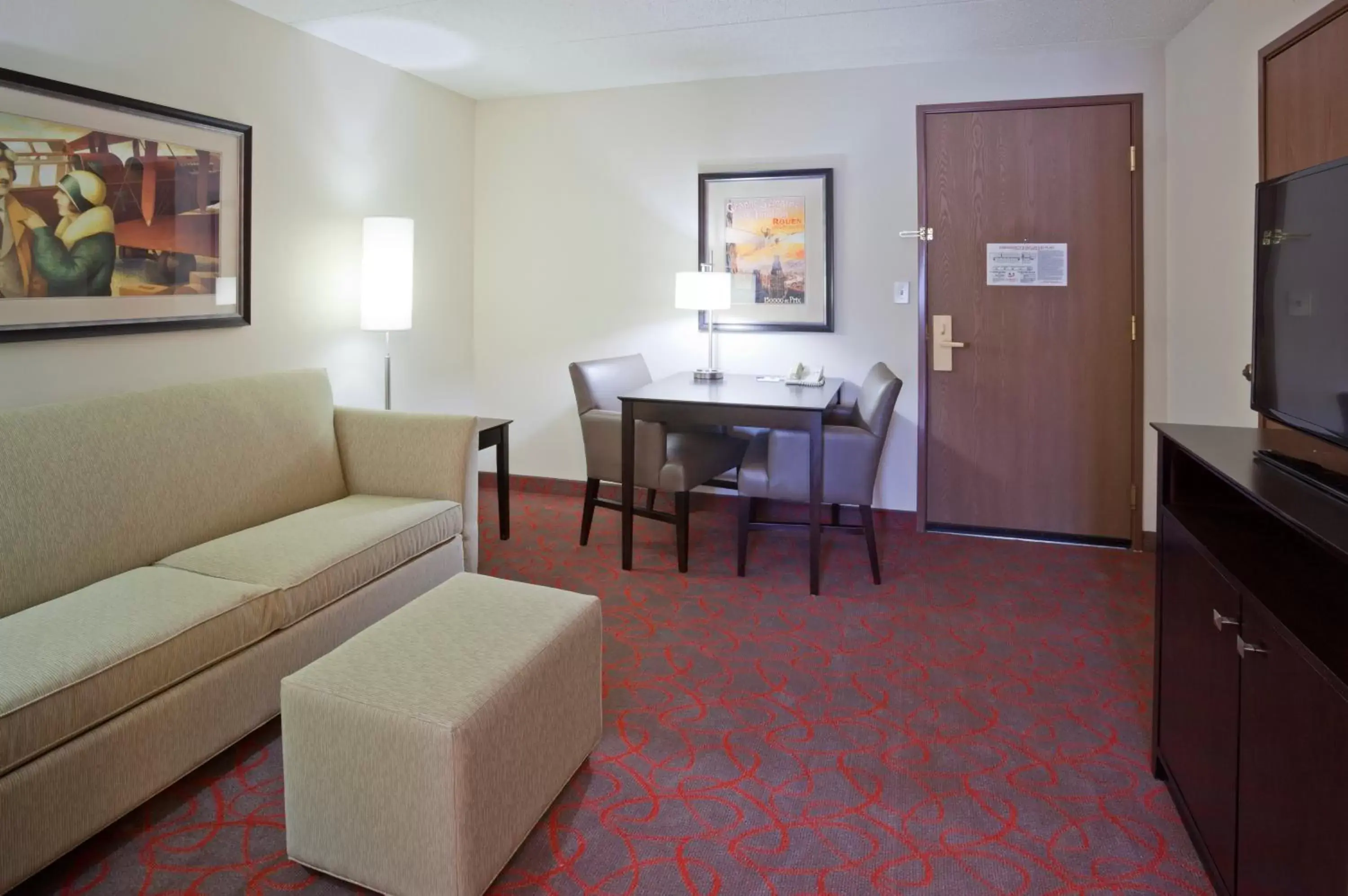 Photo of the whole room, Seating Area in Holiday Inn Express & Suites Bloomington West, an IHG Hotel