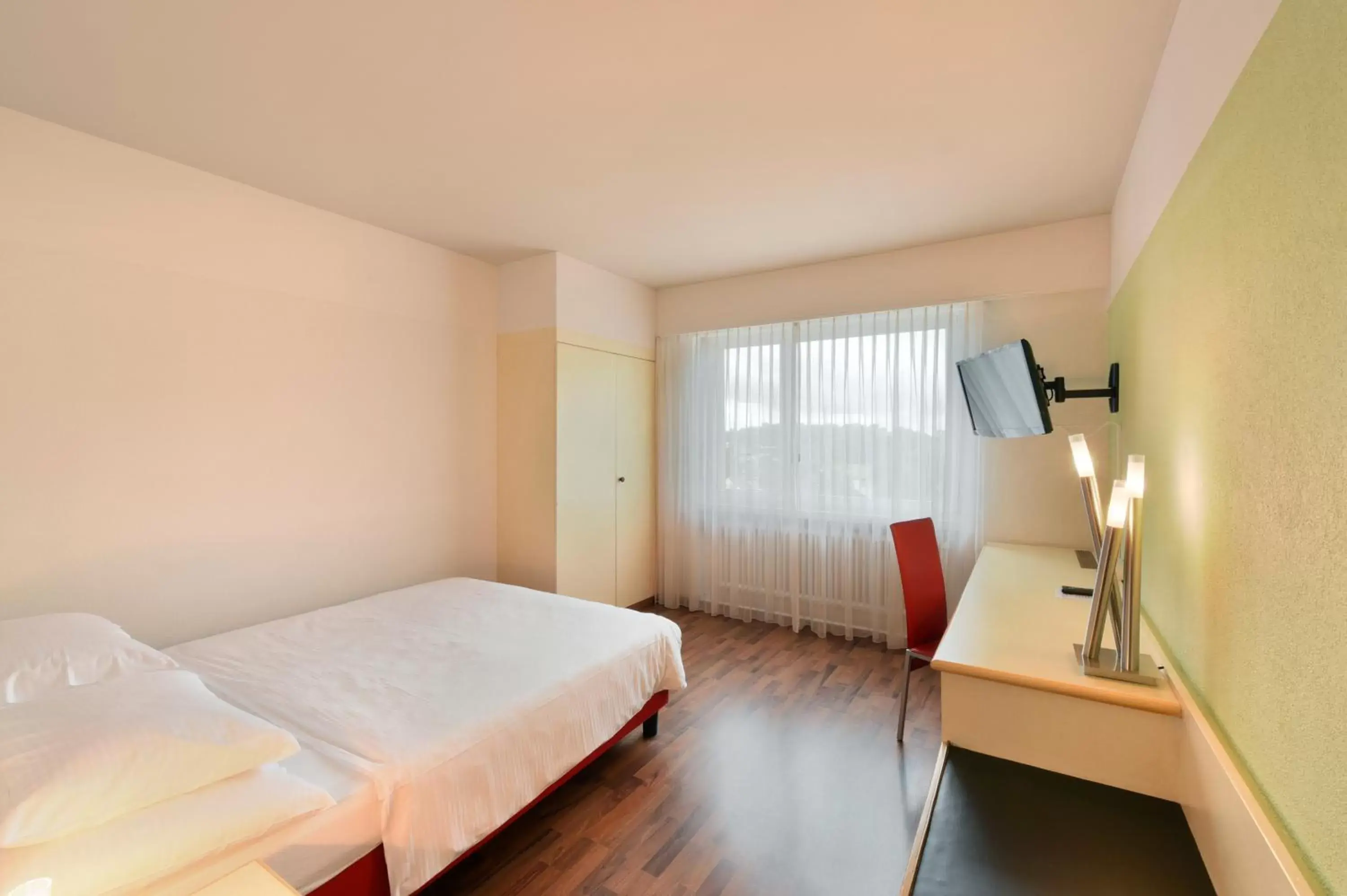 Photo of the whole room, Bed in City Hotel Biel Bienne Free Parking