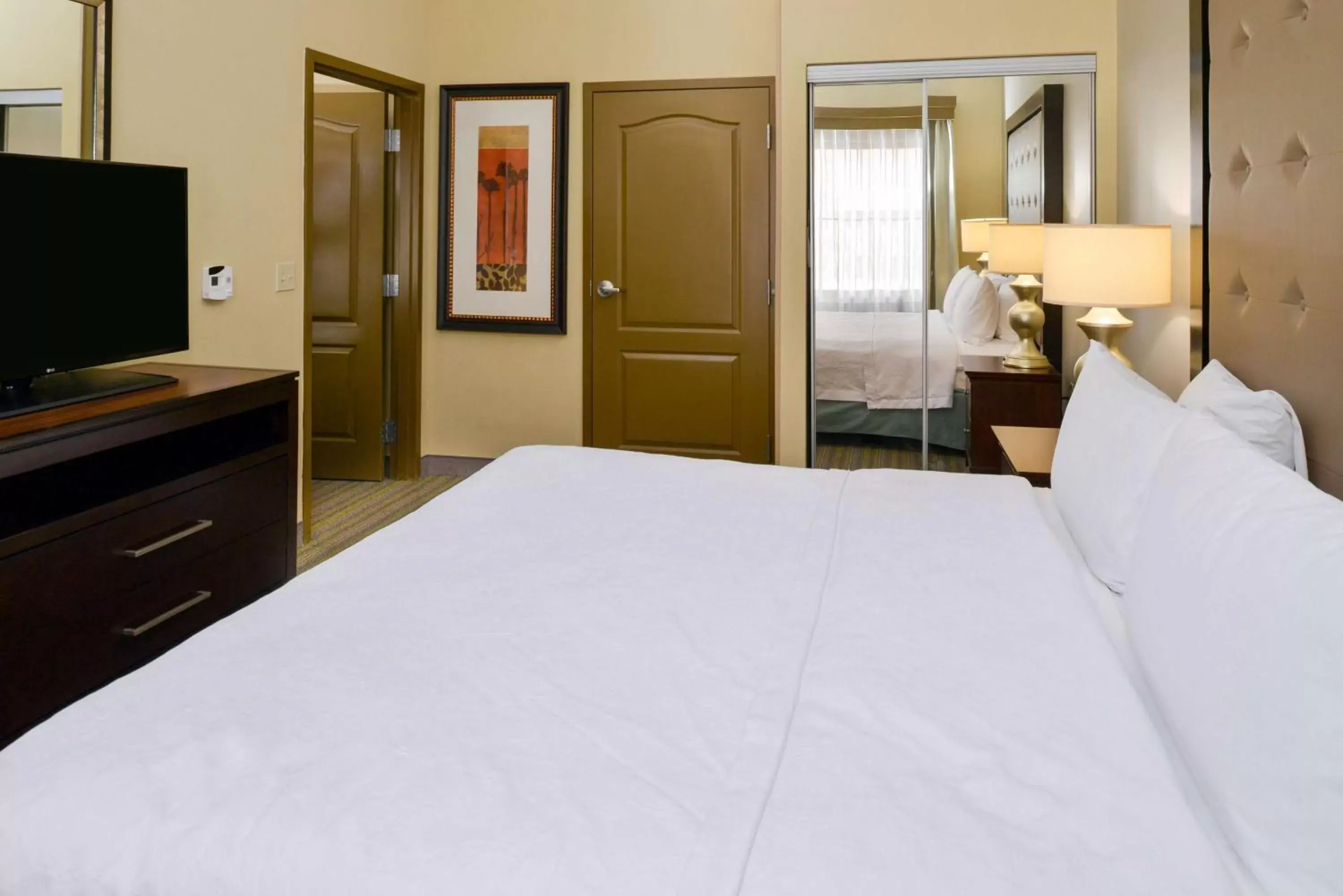 Bed in Homewood Suites by Hilton Fresno