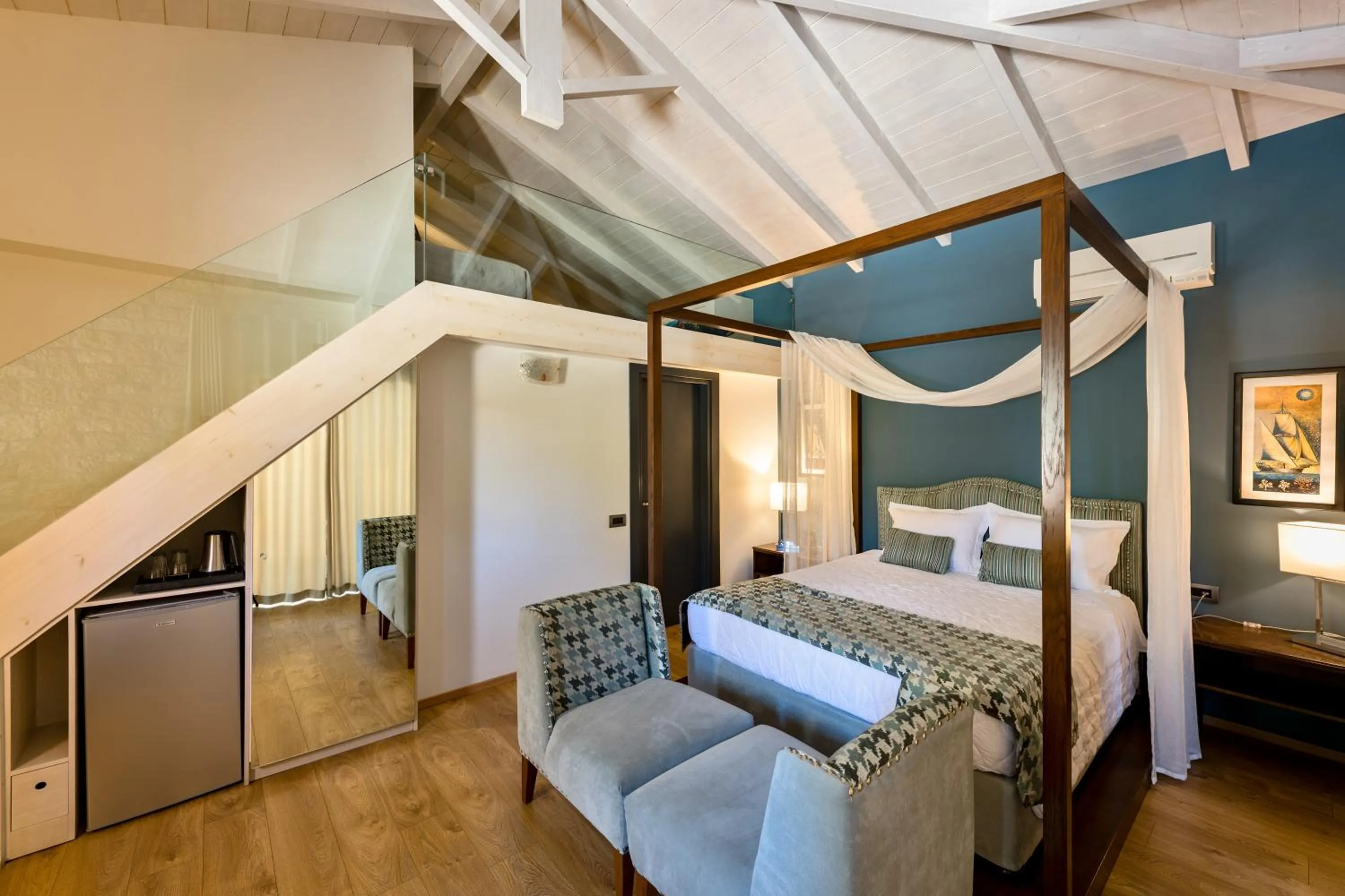 Bed in Anthemion Suites and Villas