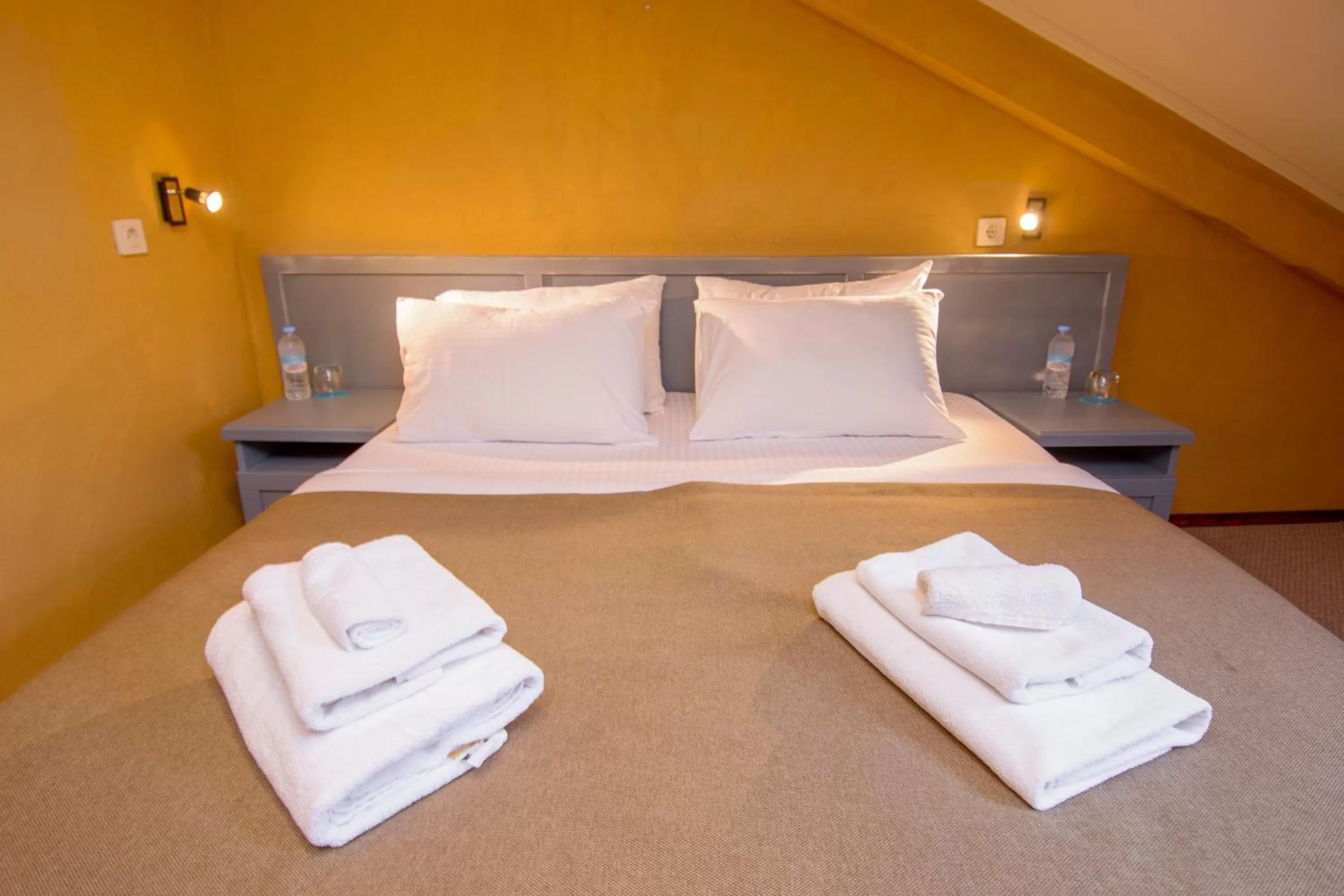 Bed in Kindli Boutique Hotel