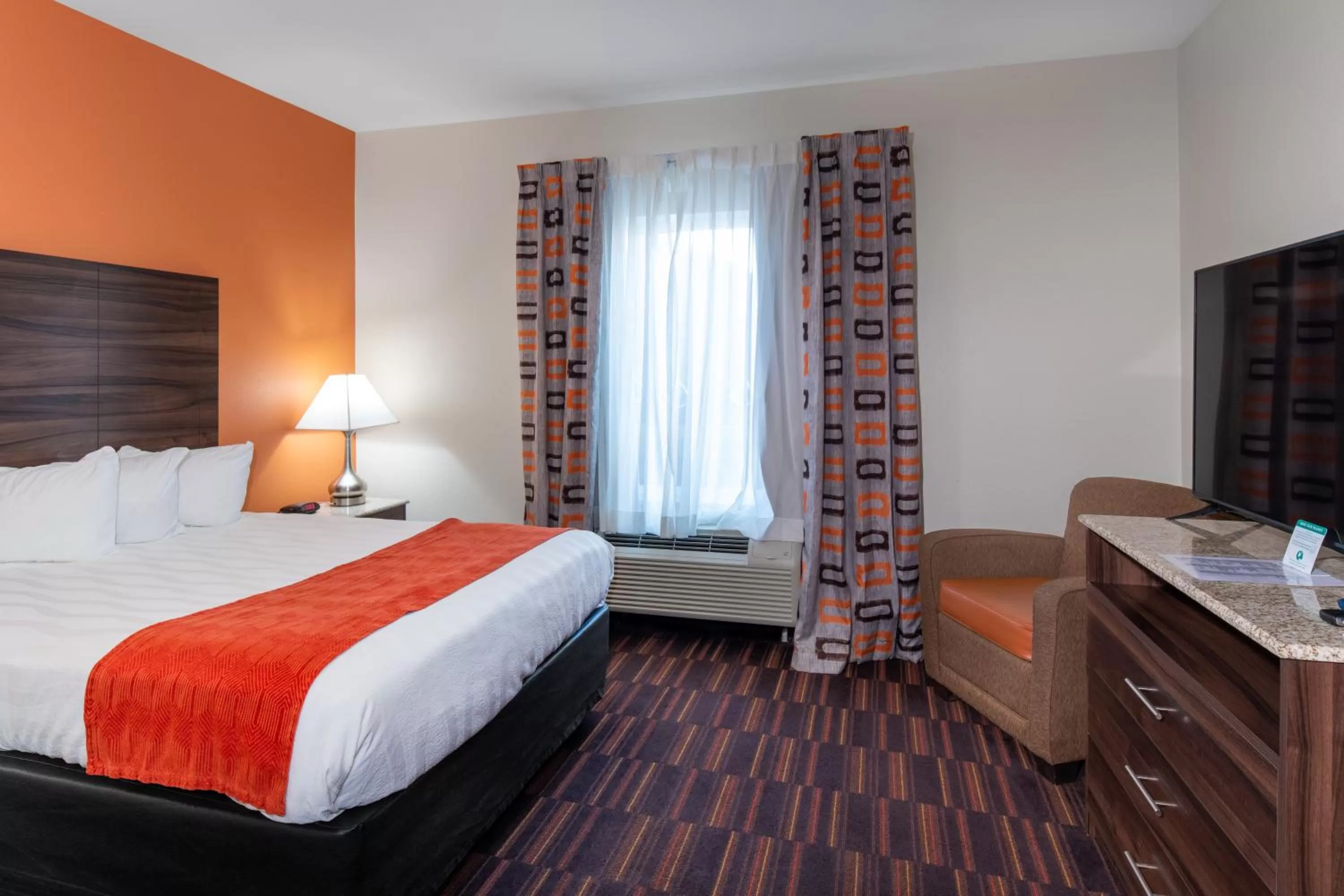 Bed in Home Away Kitchen Suites Enid