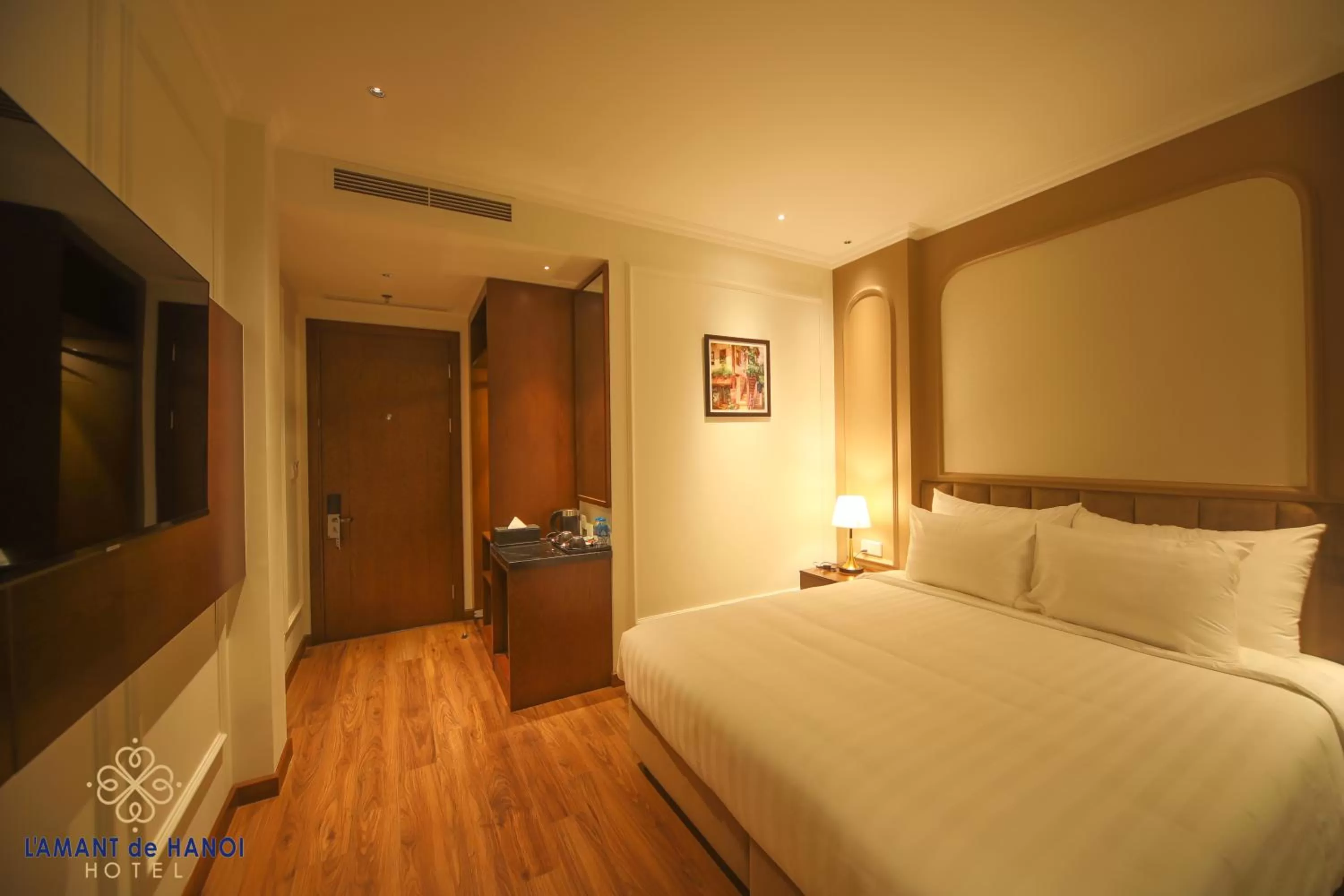 Bed in L'amant de Hanoi Hotel - khách sạn Lamant de Hà Nội