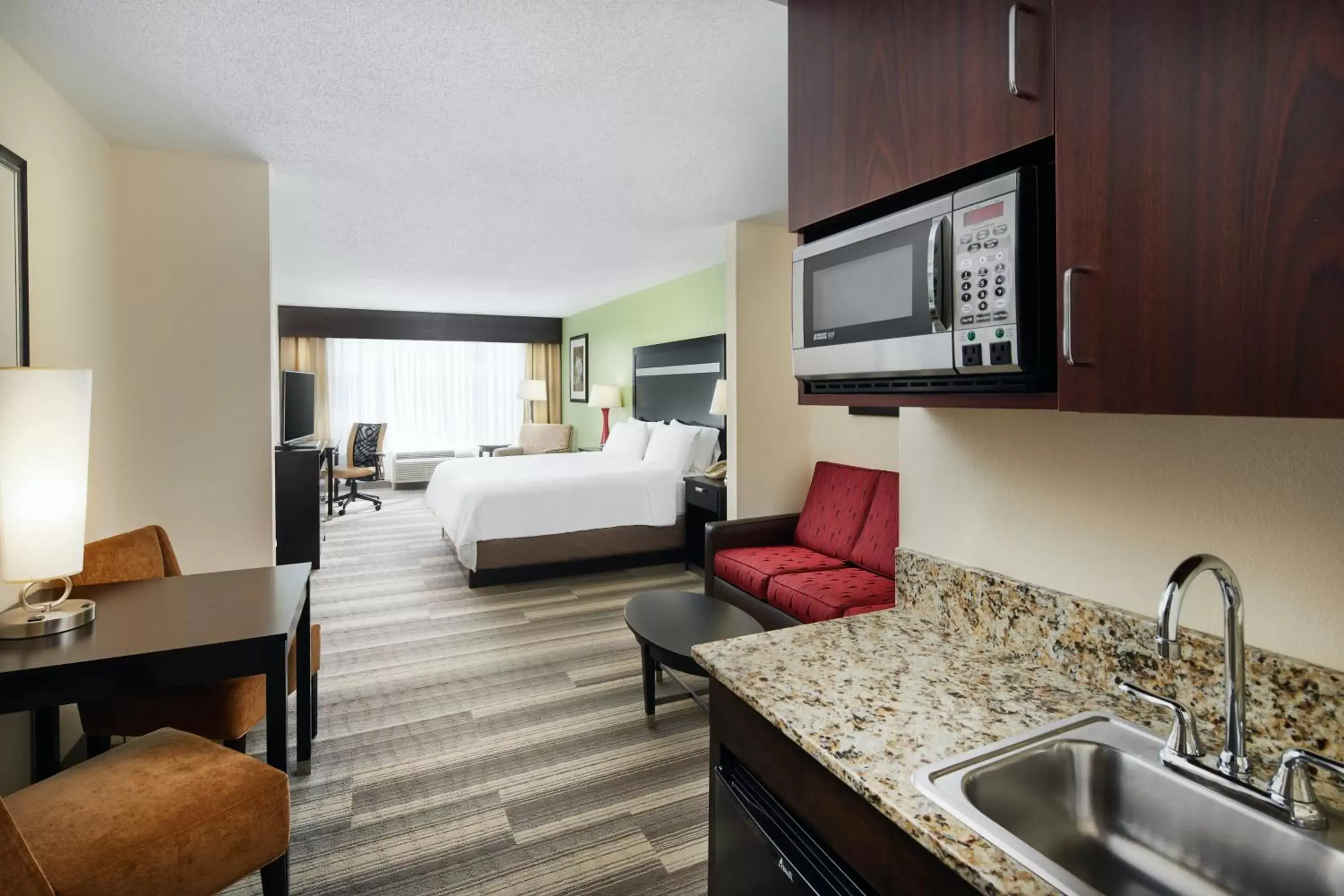 Photo of the whole room, Kitchen/Kitchenette in Holiday Inn Express & Suites I-26 & Us 29 At Westgate Mall, an IHG Hotel