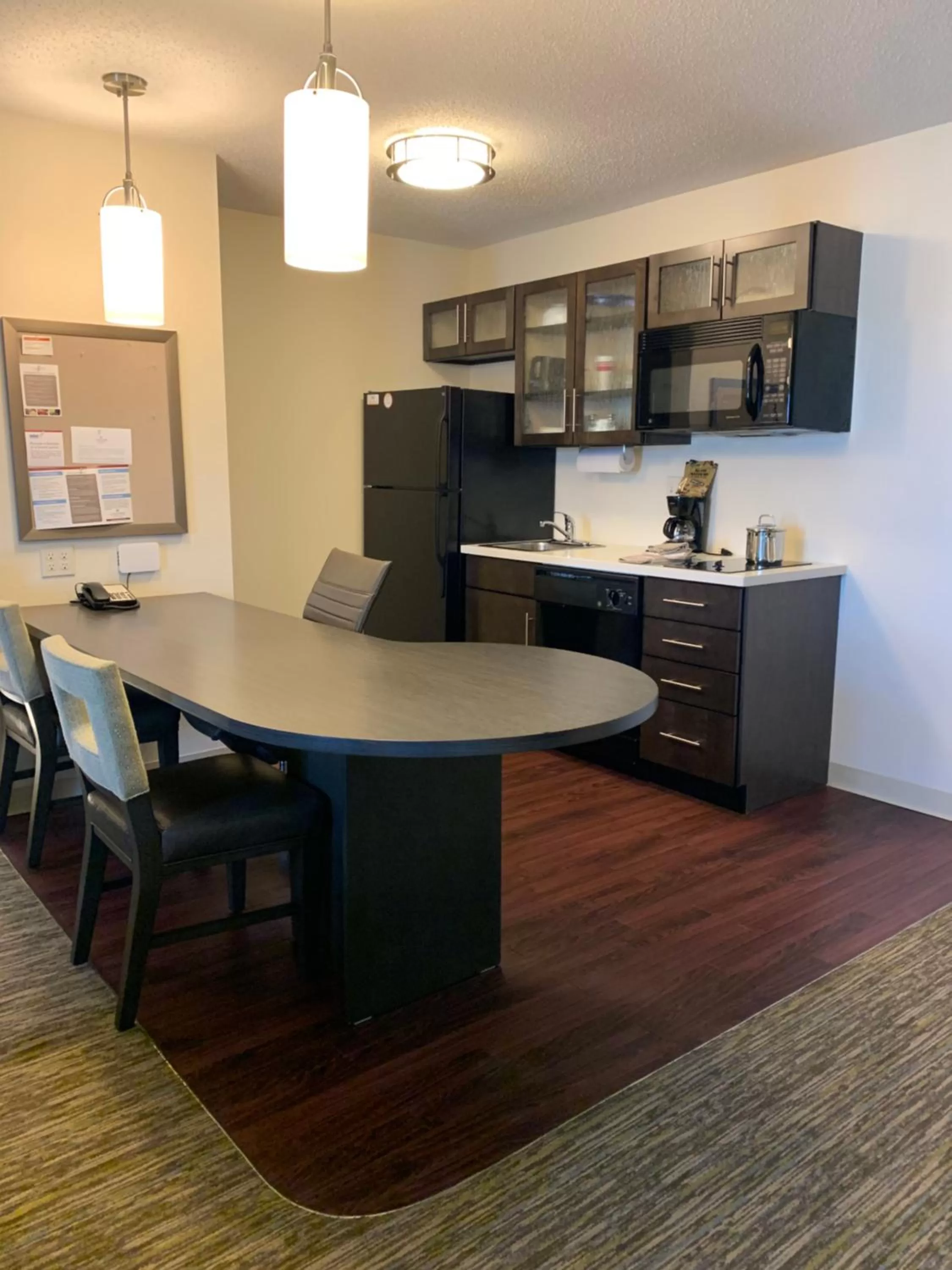 Kitchen or kitchenette in Candlewood Suites Fargo-North Dakota State University by IHG