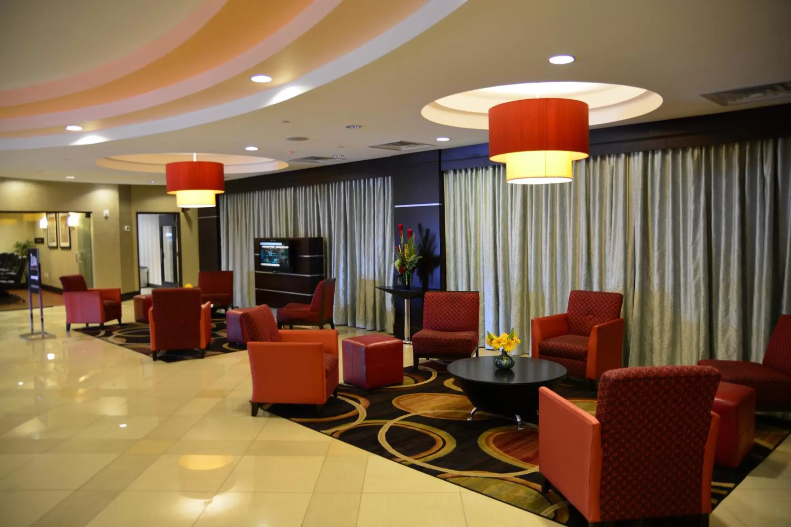 Communal lounge/ TV room, Lobby/Reception in Lux Hotel & Spa, Trademark Collection by Wyndham