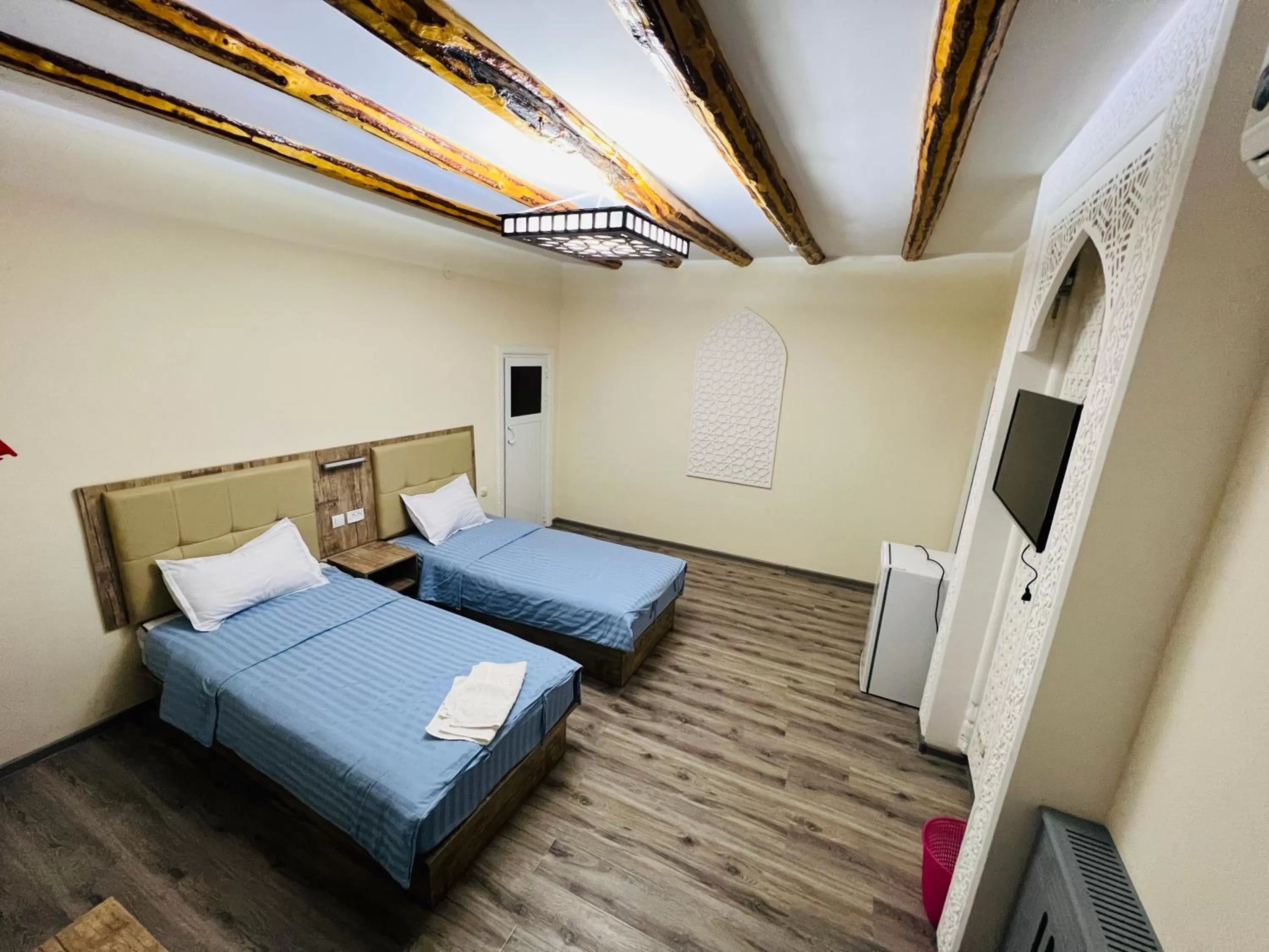 View (from property/room), Bed in Bukhara house hotel