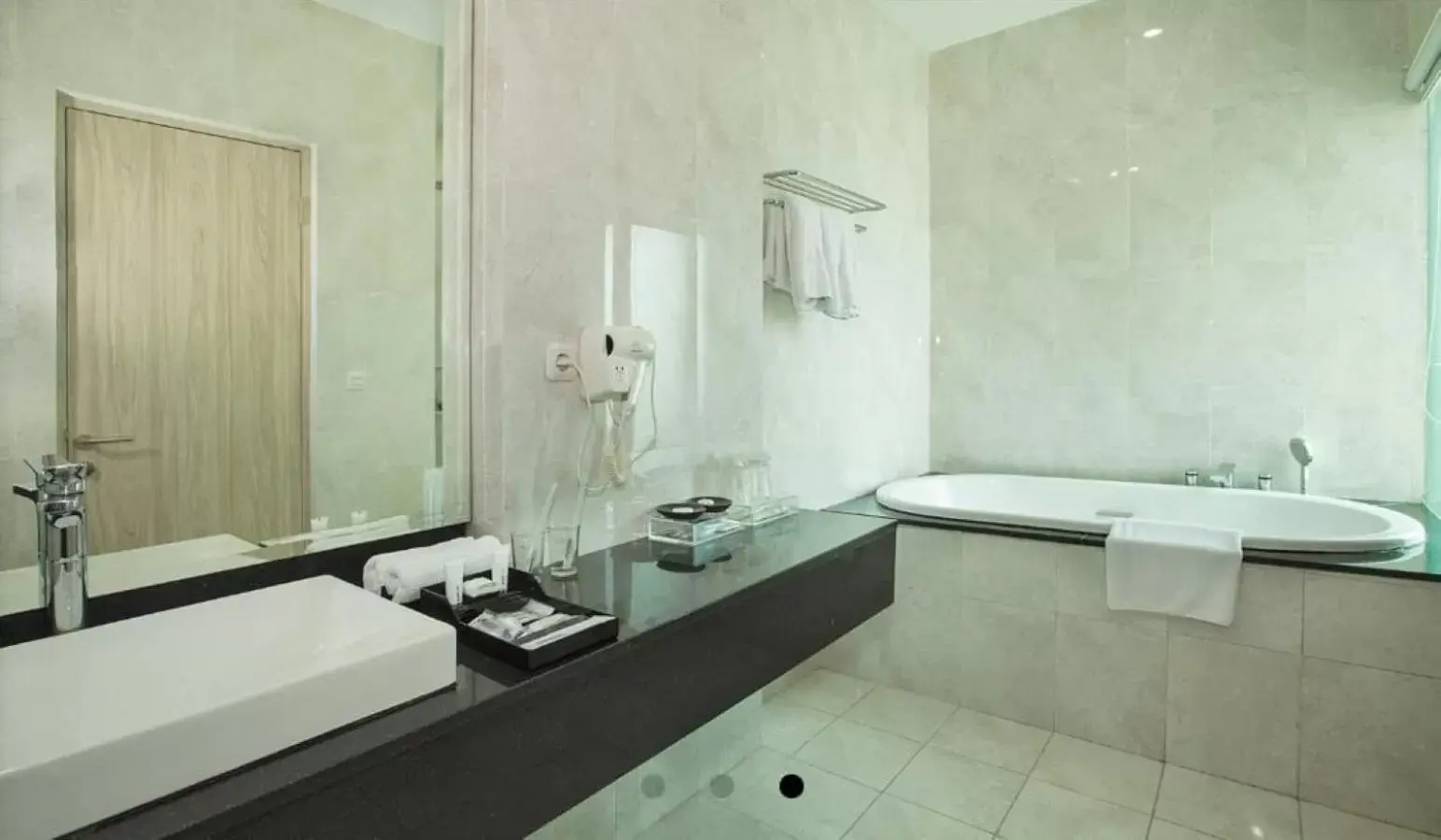 Bathroom in Sparks Life Jakarta, ARTOTEL Curated