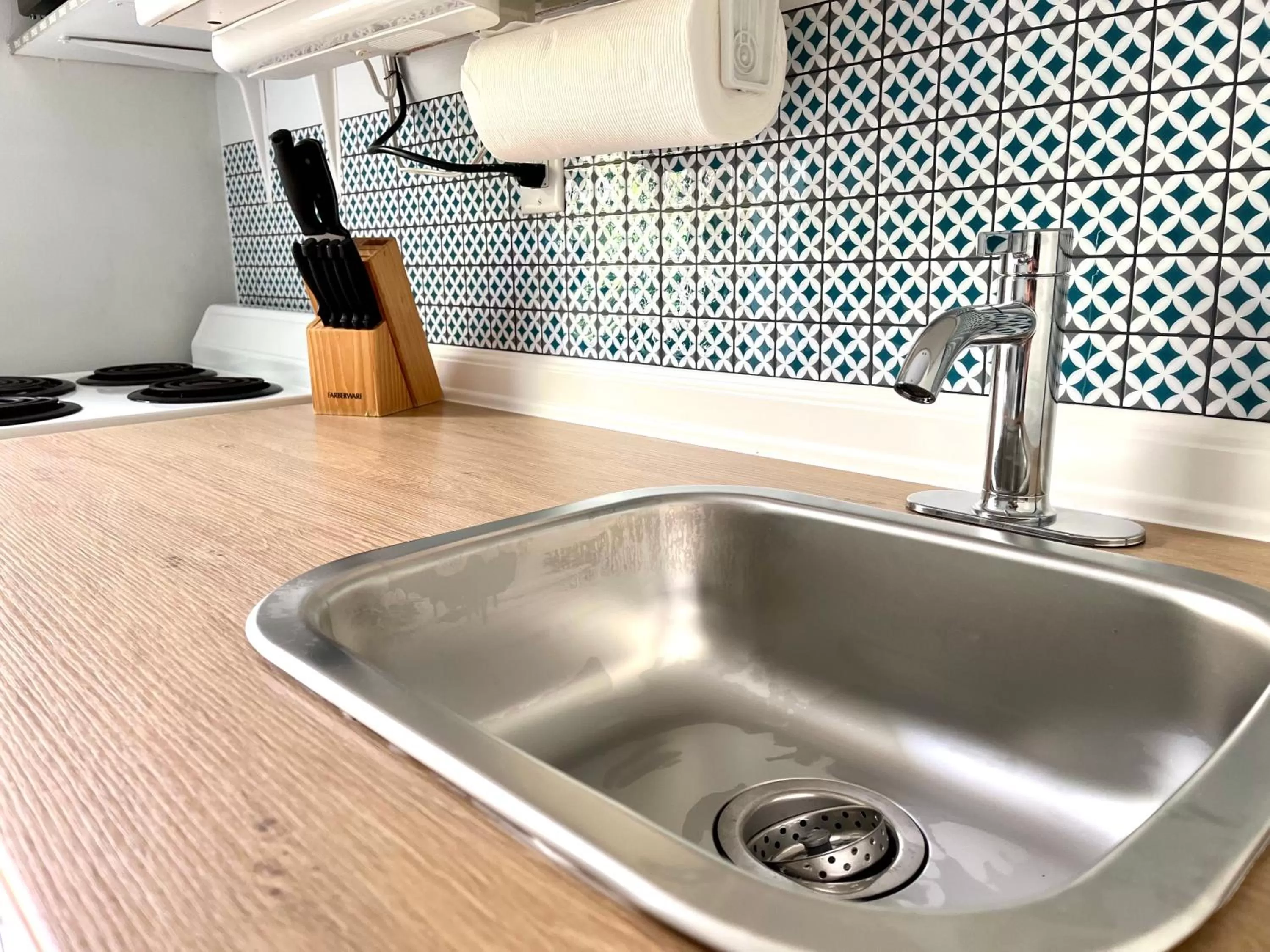 kitchen in 4145 By The Sea Inn & Suites