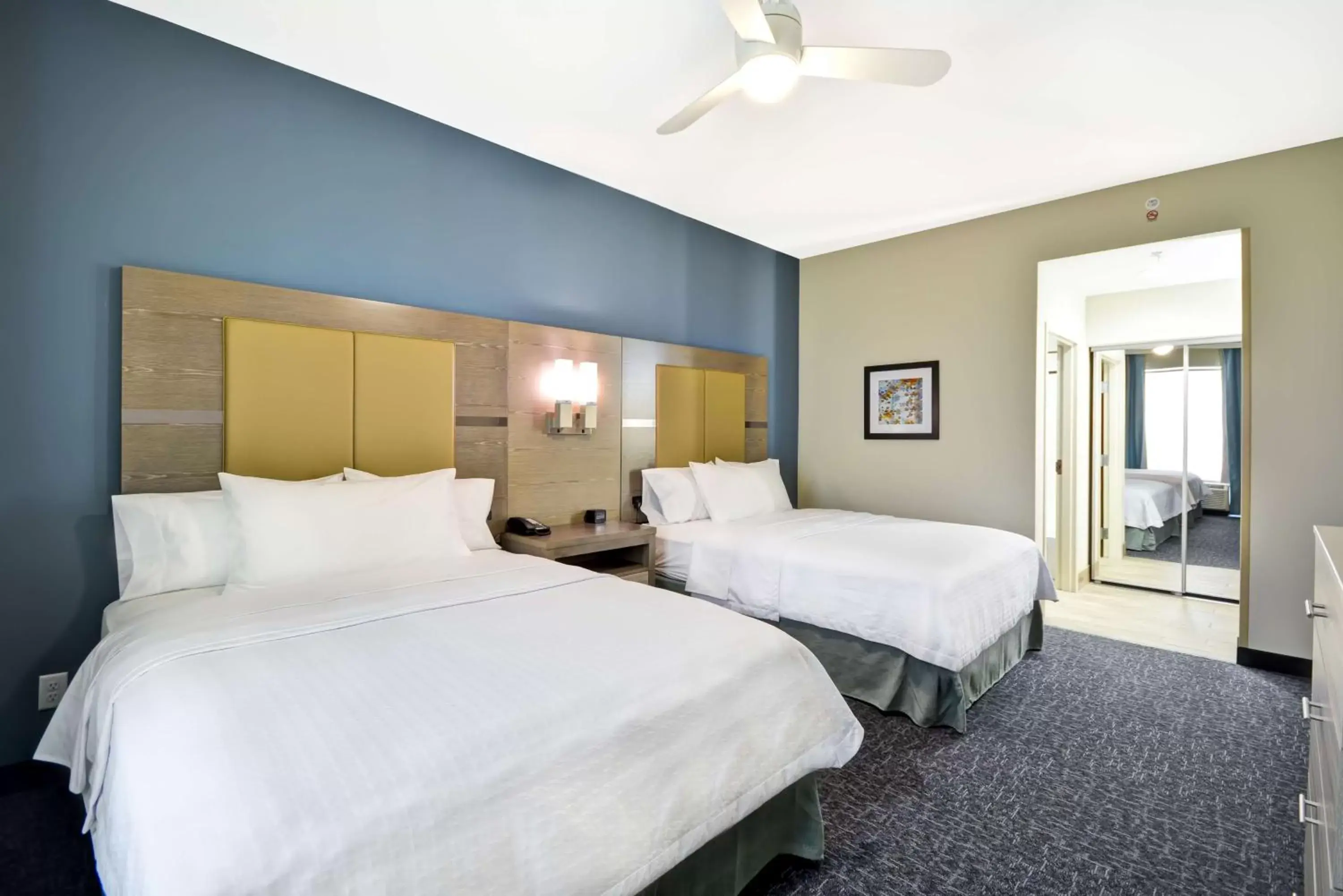 Bed in Homewood Suites by Hilton Orlando Theme Parks