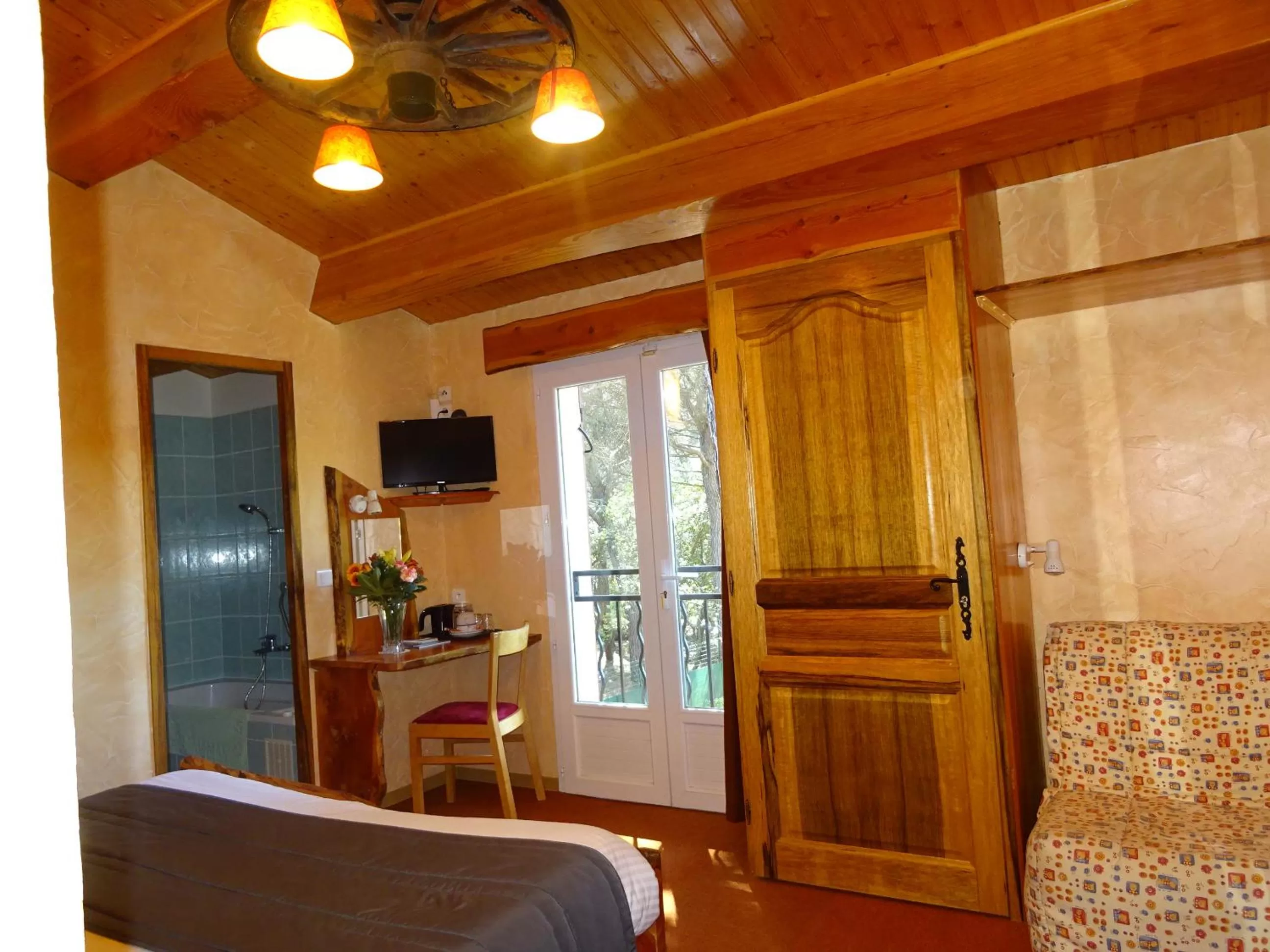 Bedroom in Les Chambres d'Hotes au Bois Fleuri