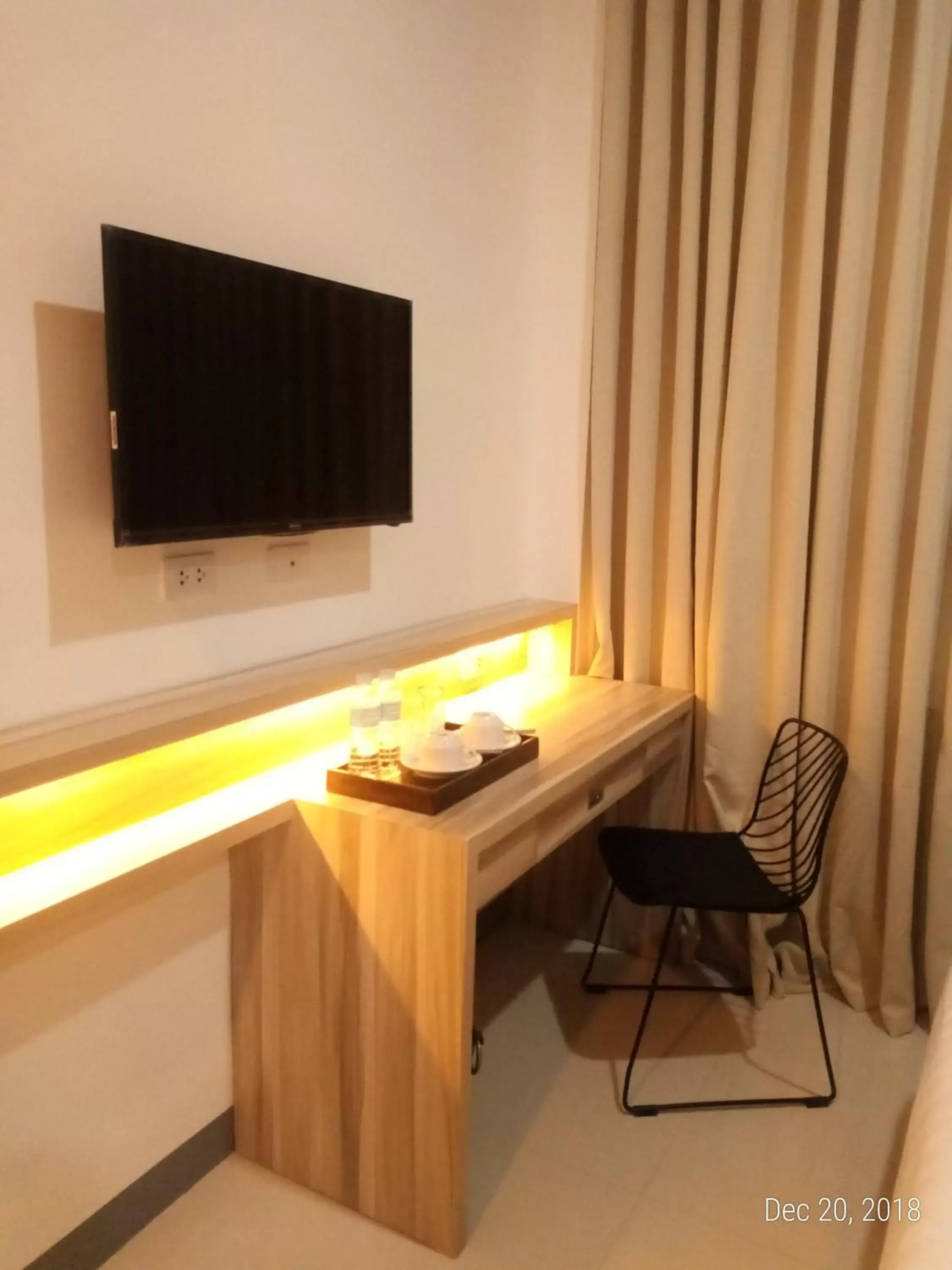 TV/Entertainment Center in Figtree Hotel