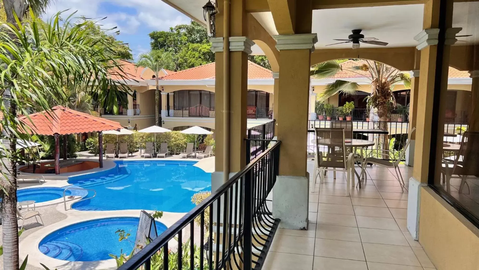 Balcony/Terrace, Pool View in Monte Carlo Luxury Condominiums