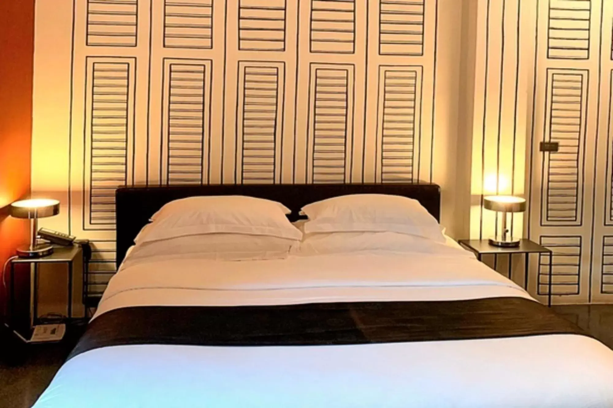 Bed in Amdaeng Bangkok Riverside Hotel - SHA Plus Certified