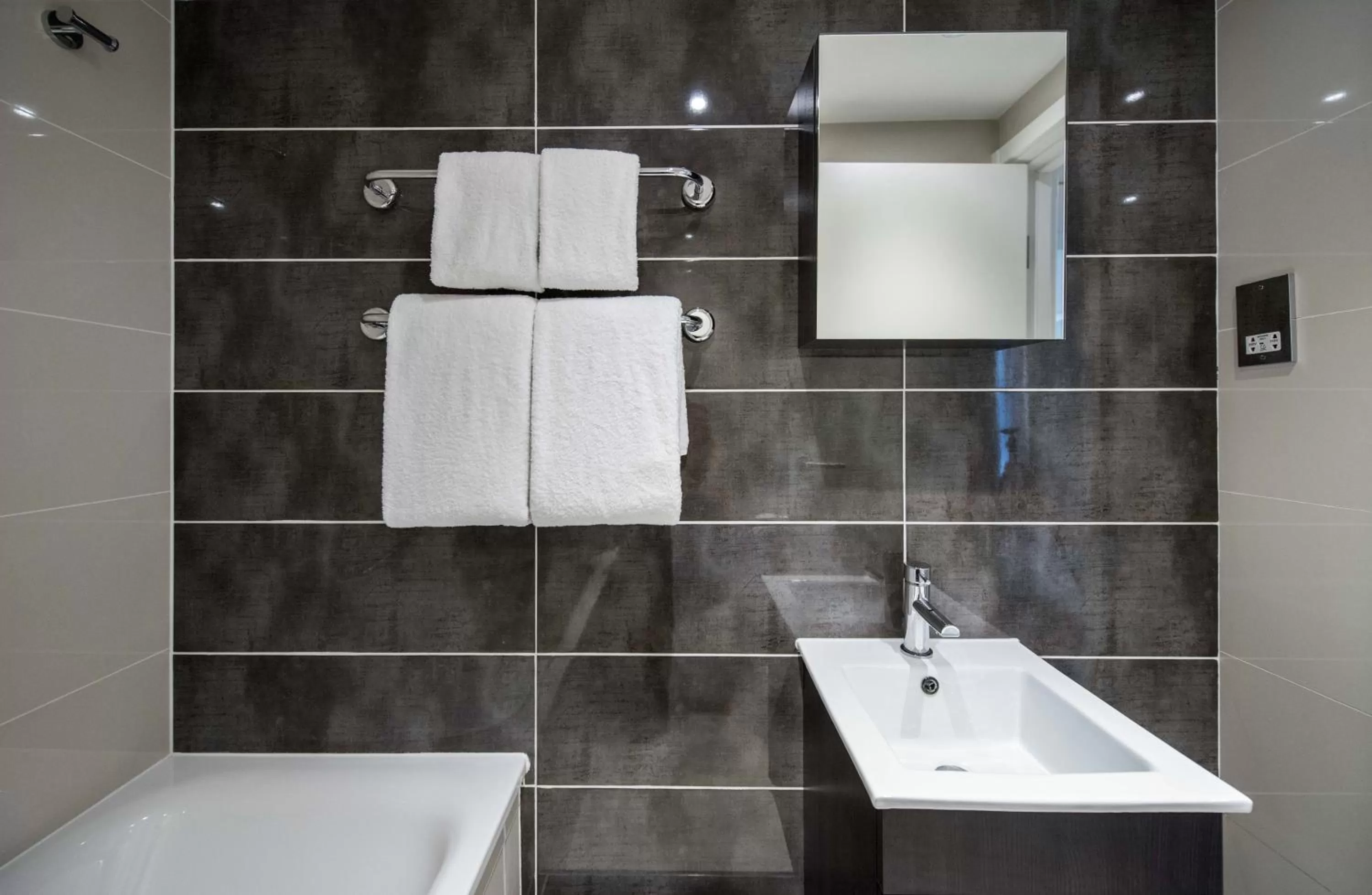 Bathroom in Holiday Inn London Kensington High St. by IHG