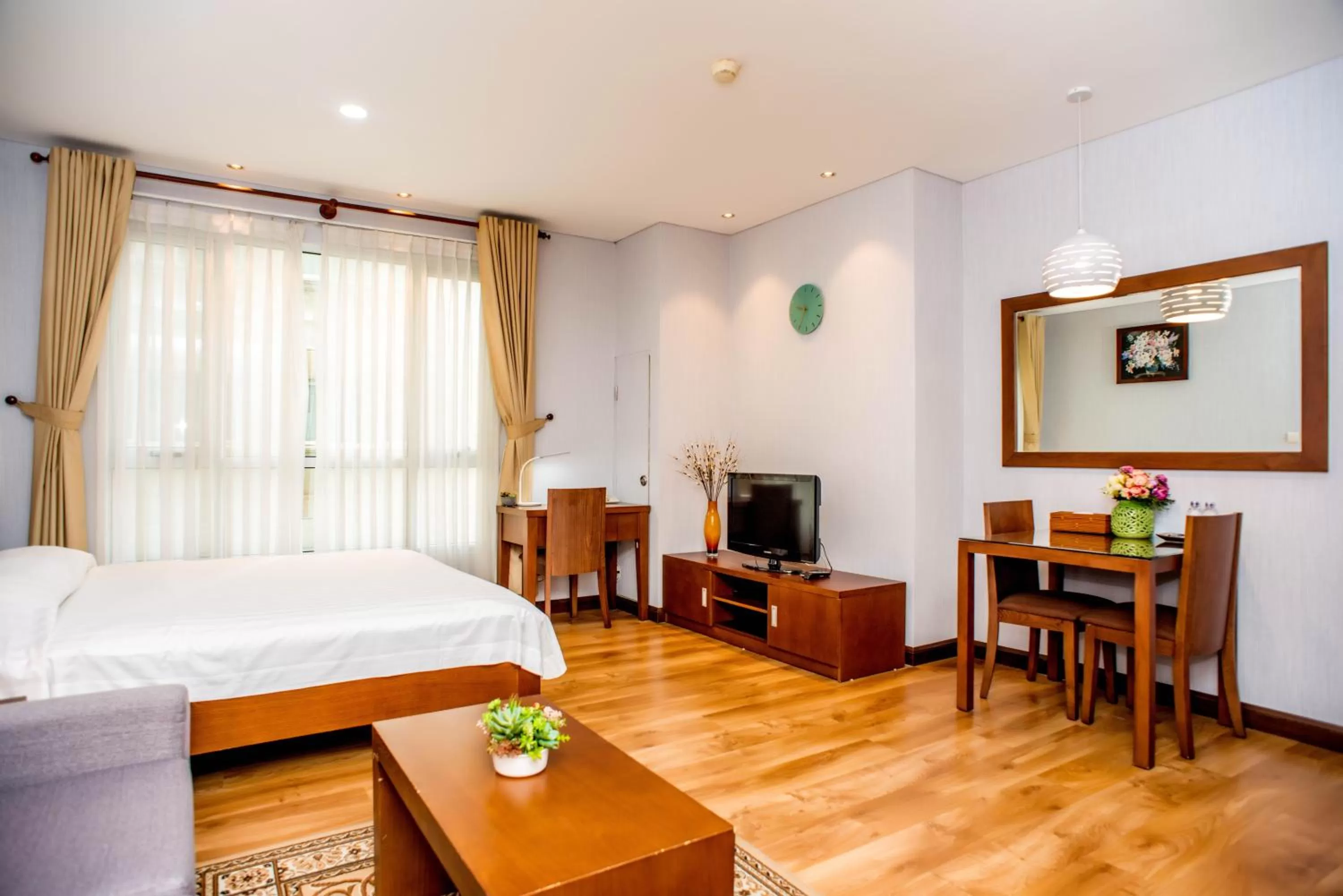 Photo of the whole room, Bed in Lancaster Ho Chi Minh Serviced Apartment Official