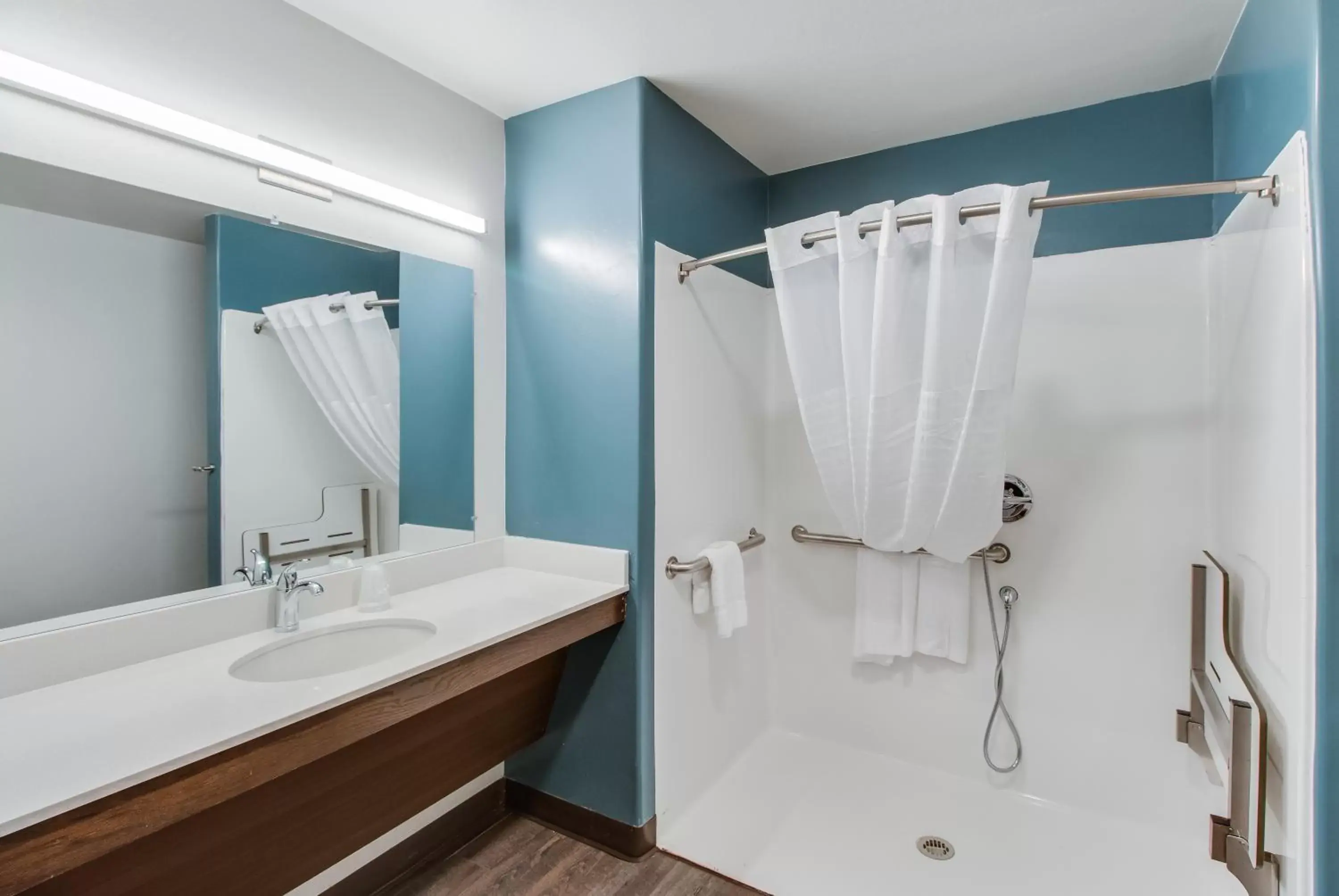 Shower, Bathroom in WoodSpring Suites Bakersfield Airport