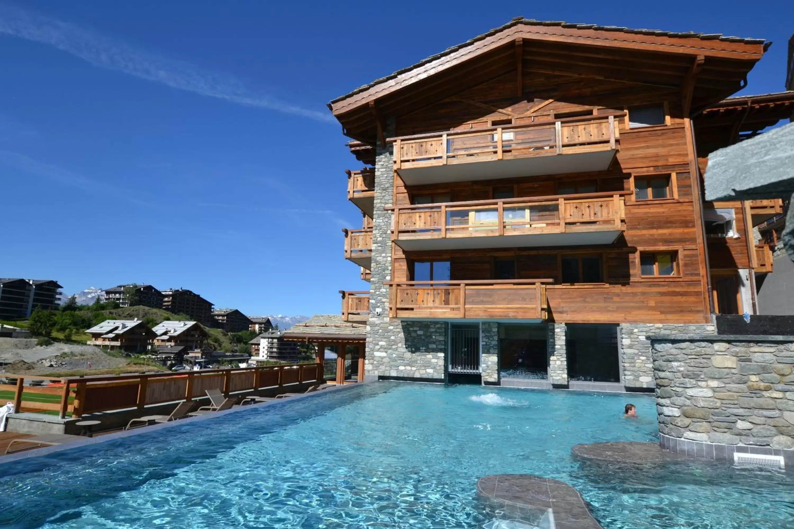 Open Air Bath, Property Building in Nendaz 4 Vallées & SPA 4* Superior