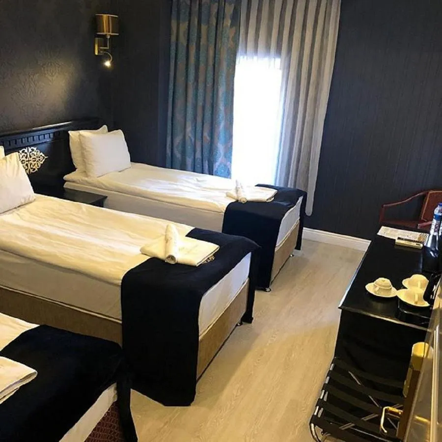 Bed in Golden Gate Hotel Topkapı