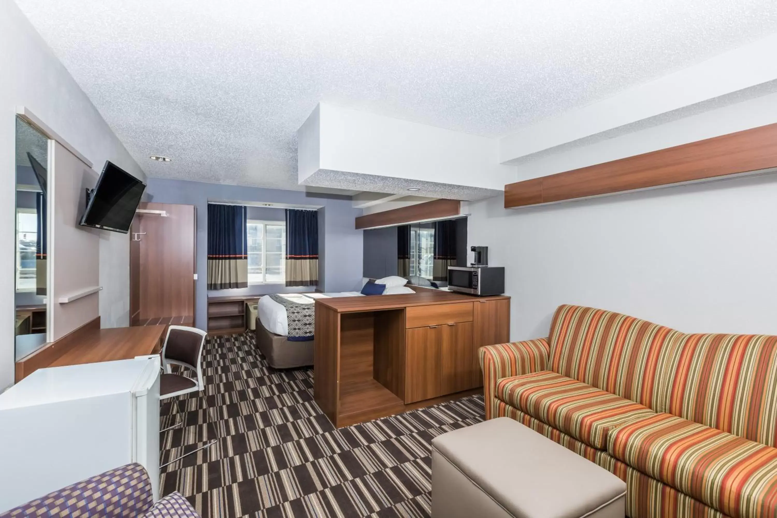 Property building, Seating Area in Microtel Inn & Suites by Wyndham Sioux Falls