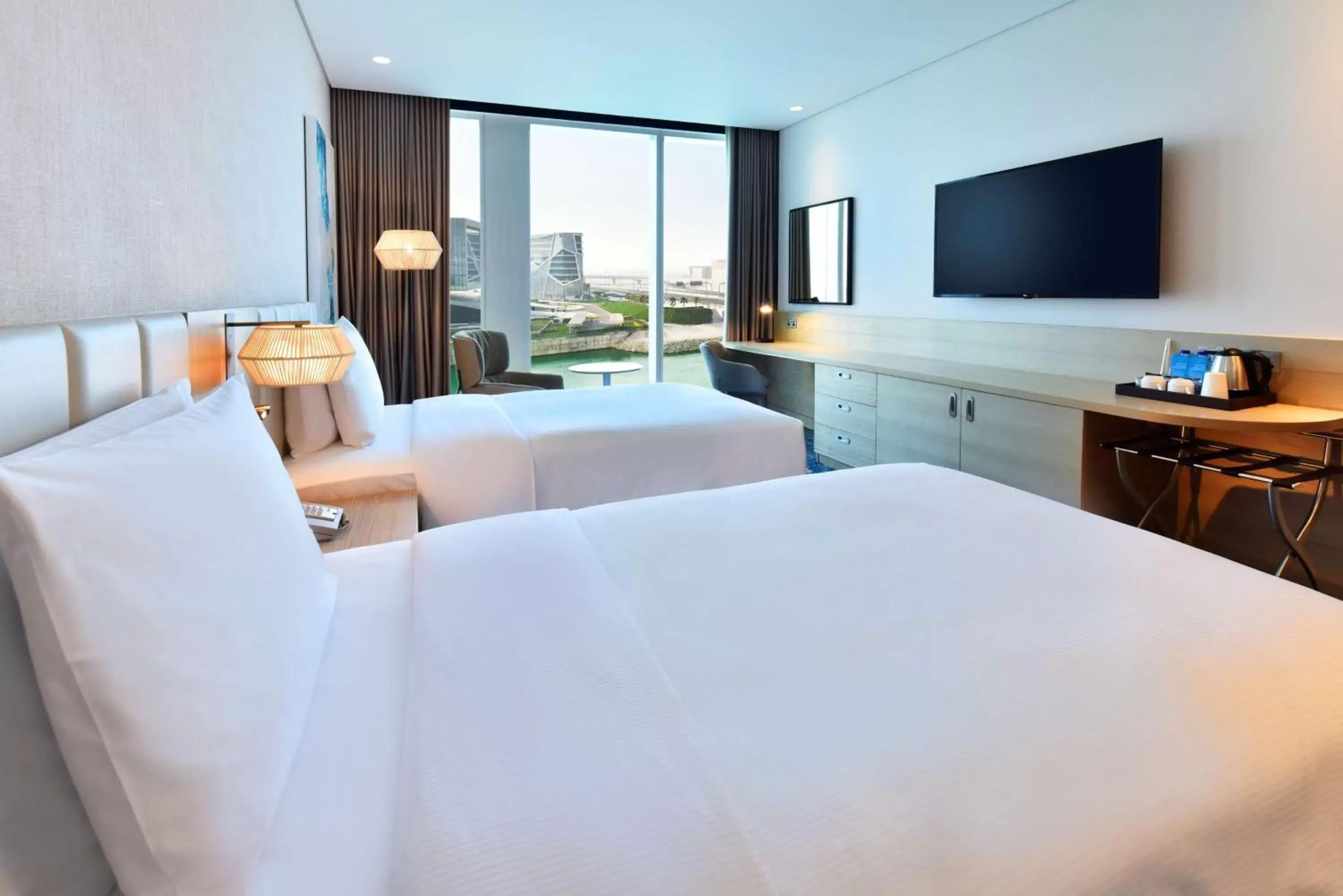 Bedroom, TV/Entertainment Center in Hilton Garden Inn Bahrain Bay