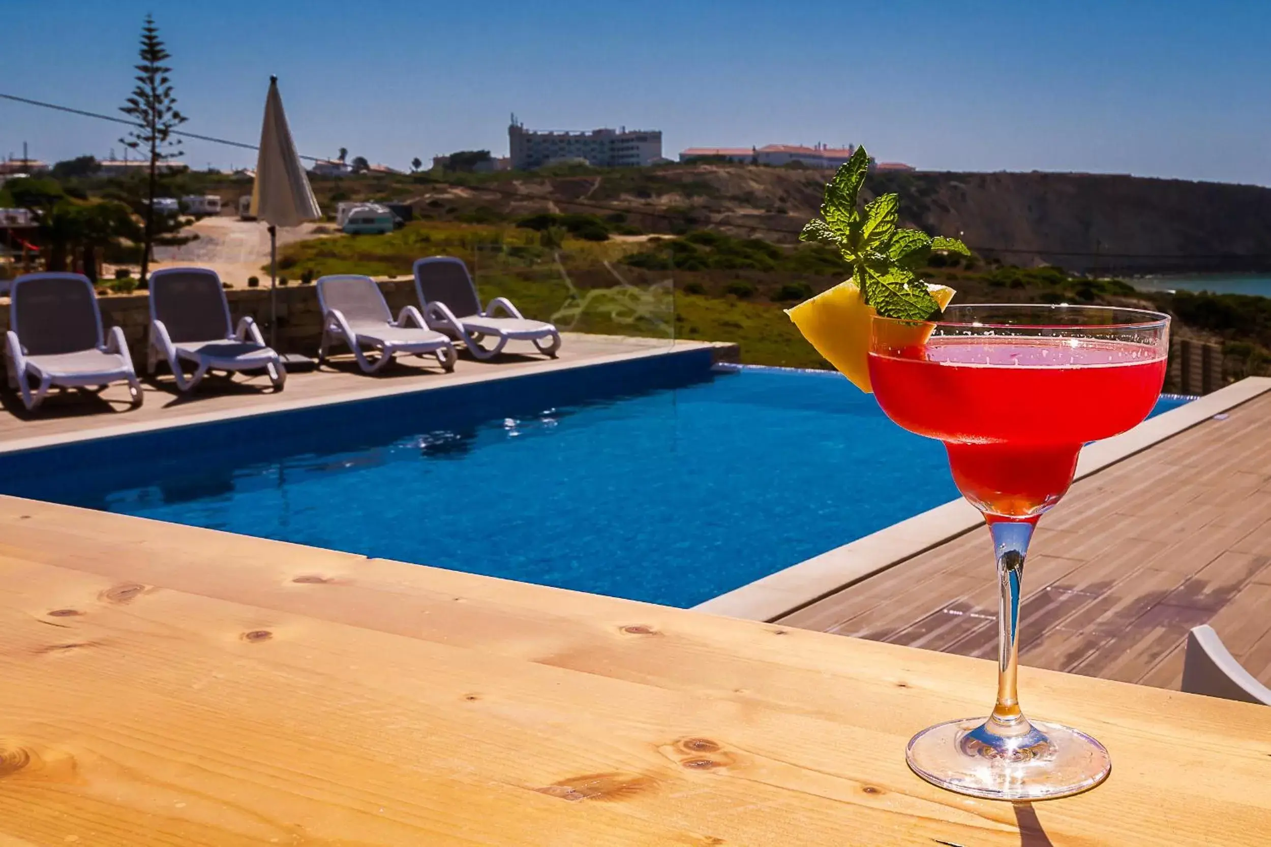 Lounge or bar, Swimming Pool in Mareta Beach House - Boutique Residence