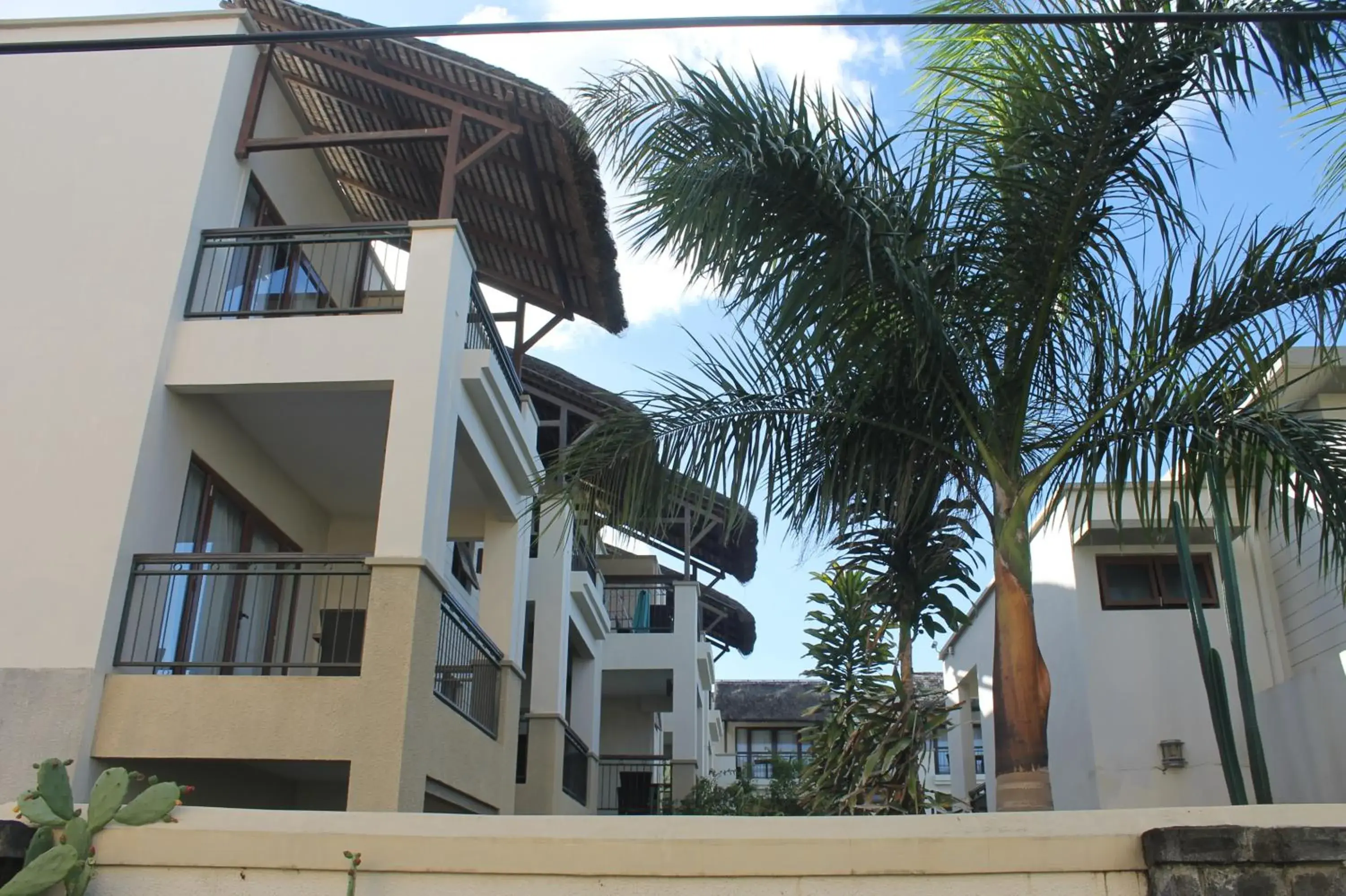 Facade/entrance, Property Building in Grand Baie Suites