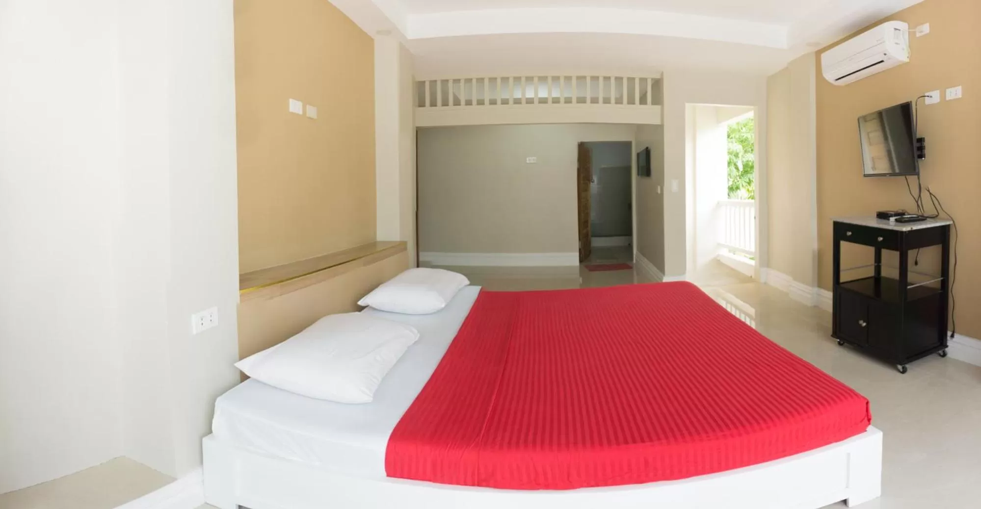 Bed in Sandscape Hotel