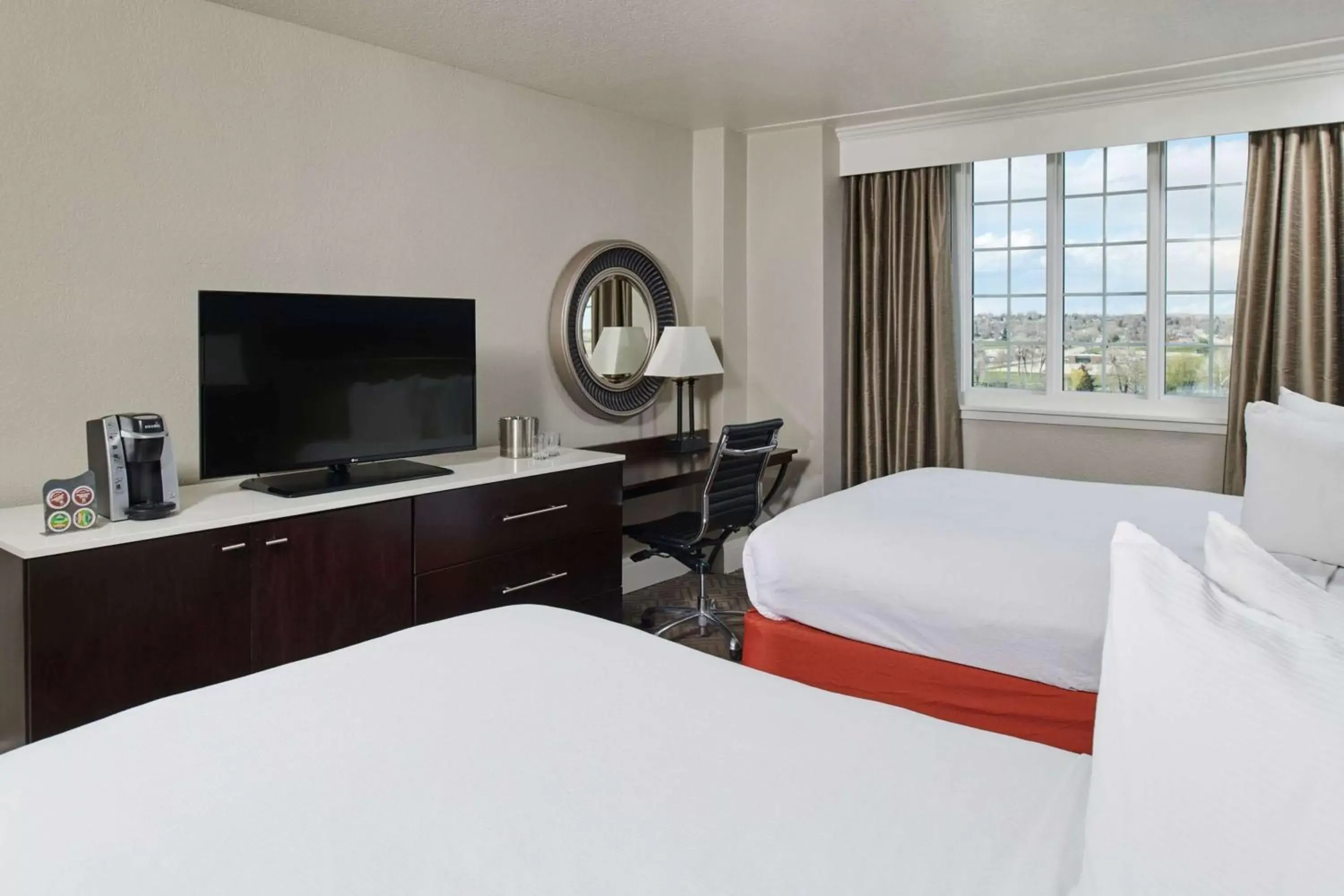 Bedroom, TV/Entertainment Center in Hotel Alex Johnson Rapid City, Curio Collection by Hilton
