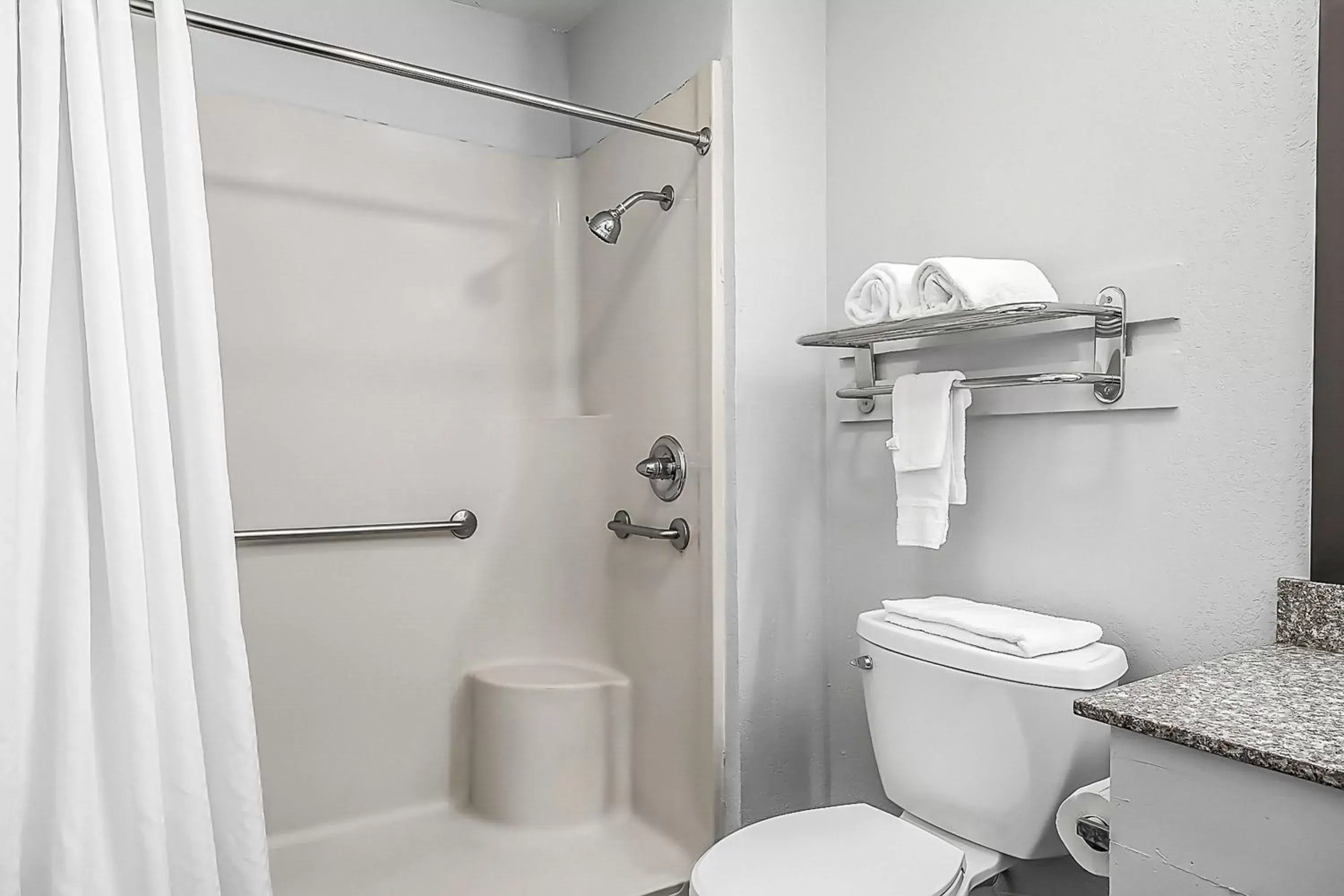 Bathroom in SureStay Hotel by Best Western Oklahoma City West