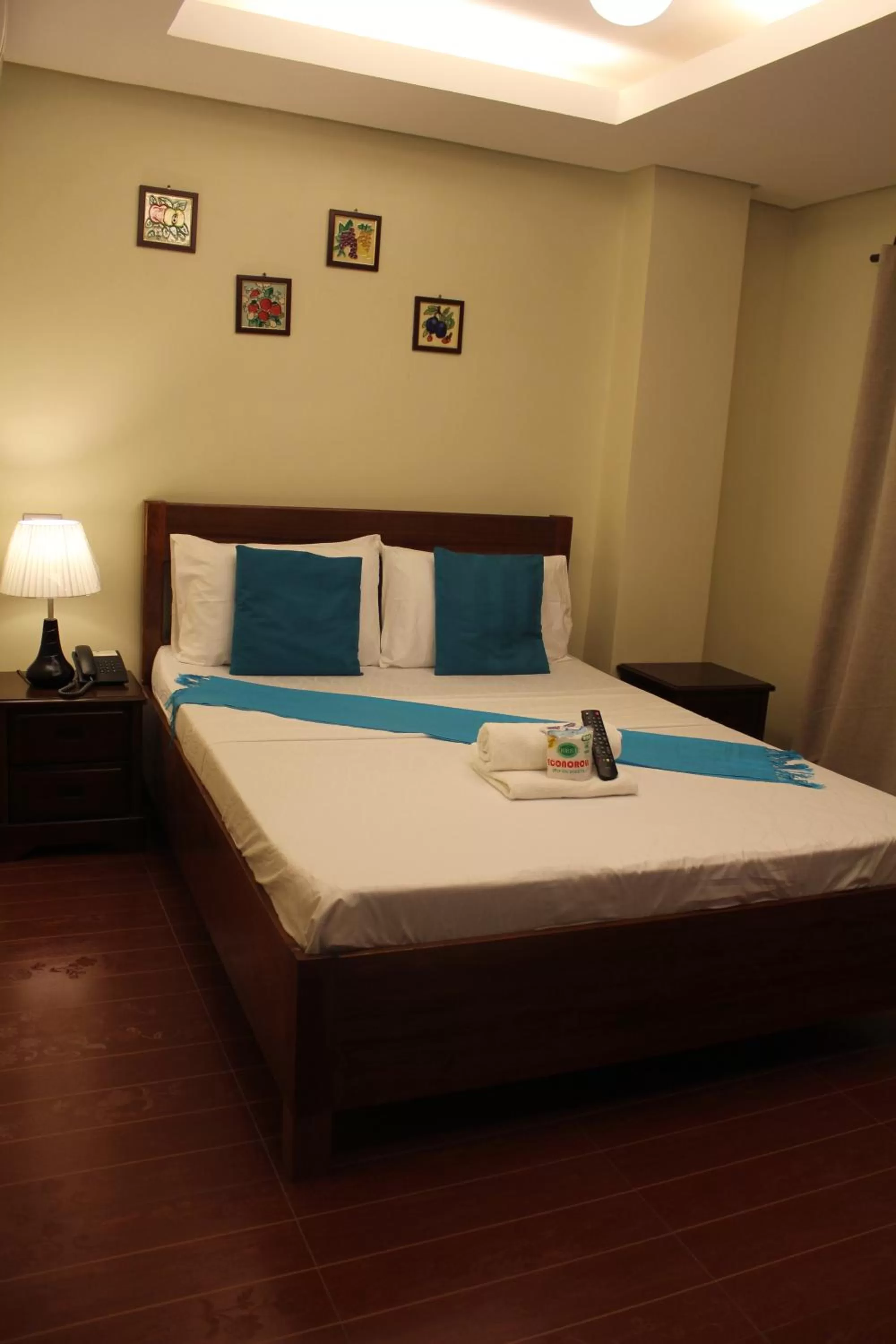 Bed in Aqua Travel Lodge