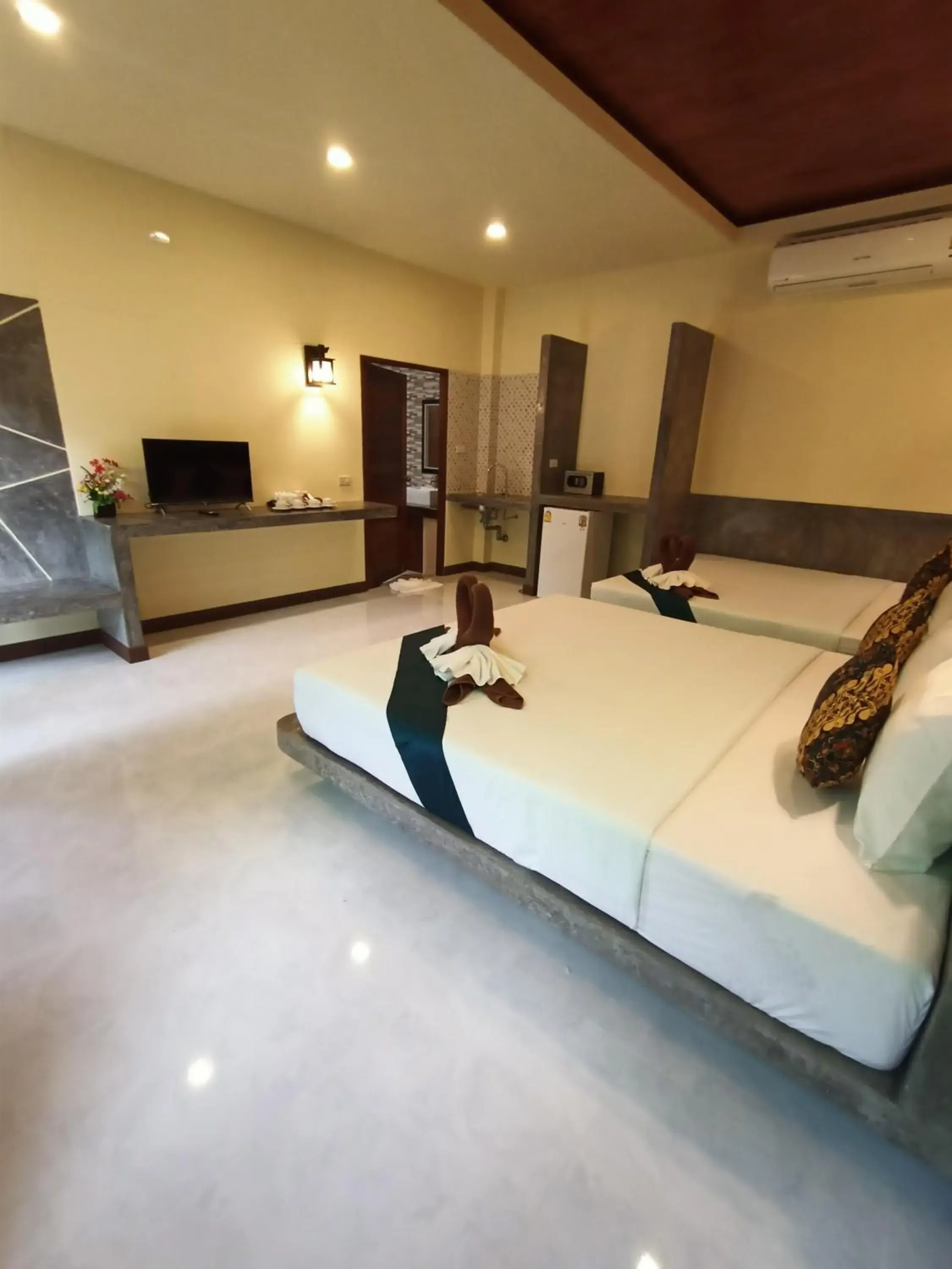 Bed in Lanta Pearl Beach Resort