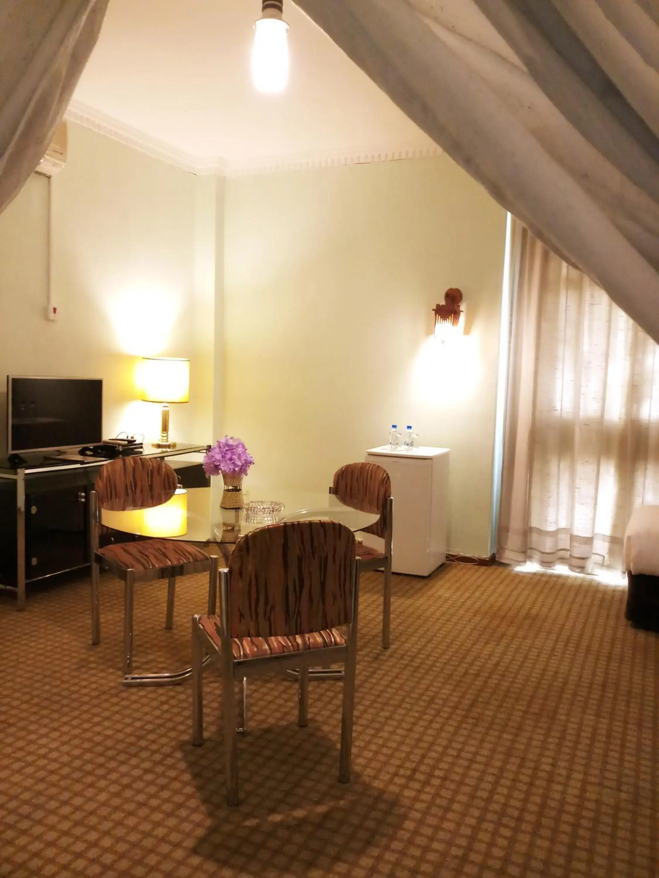 Living room, Seating Area in Oriental Palace Hotel