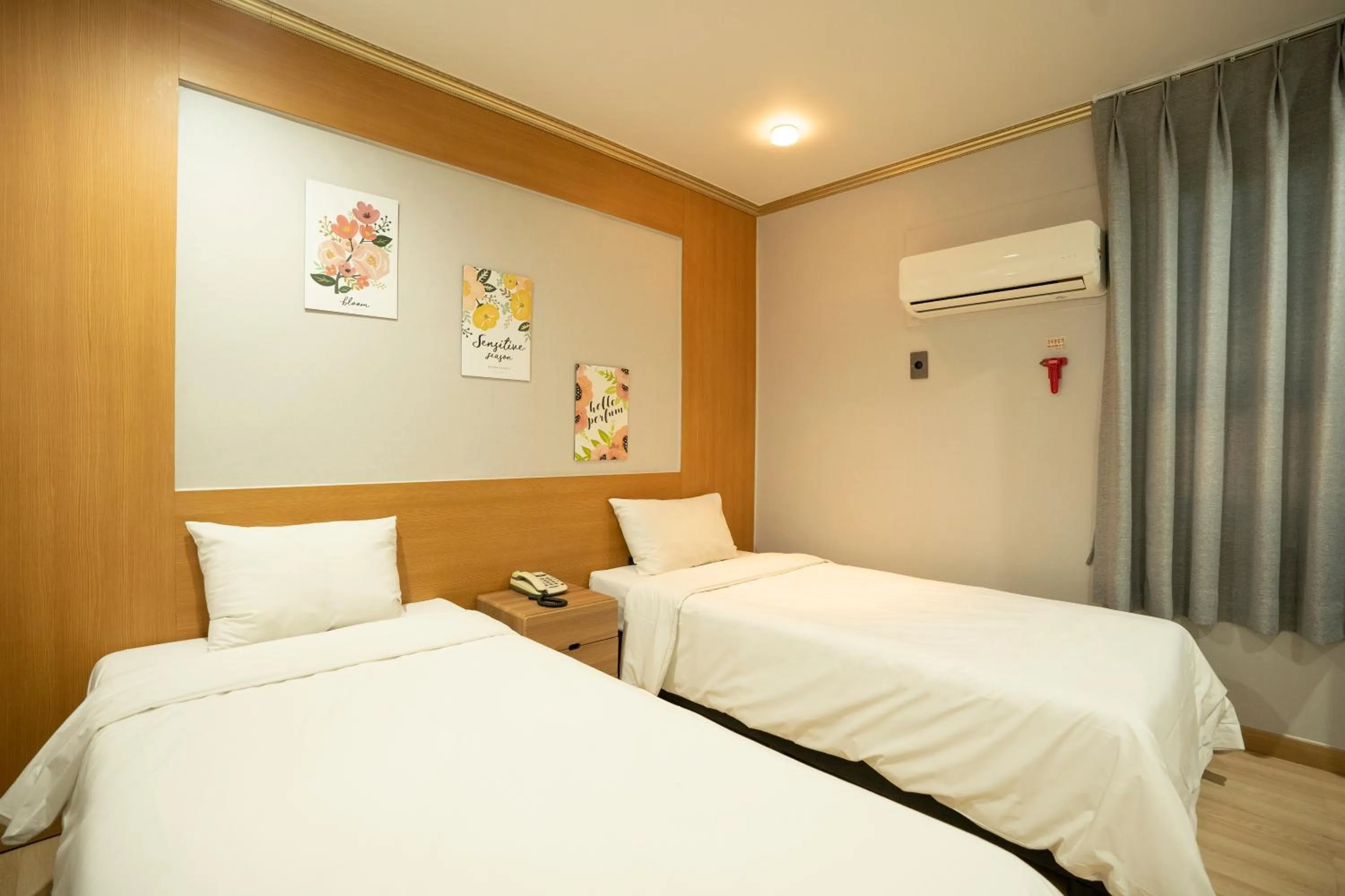 Bed in Jeju Stay Hotel