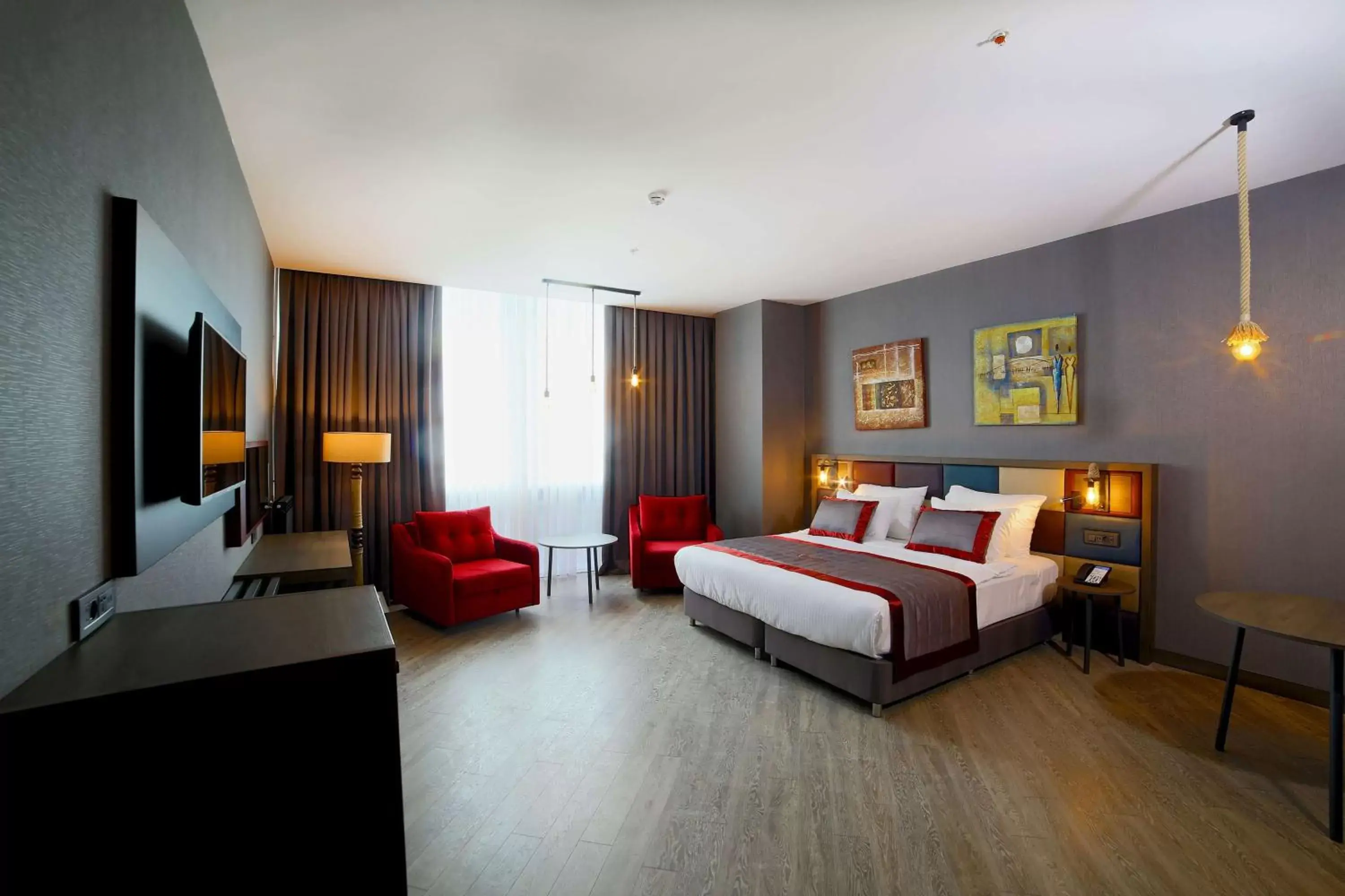 Photo of the whole room in Ramada Encore by Wyndham Istanbul Avcilar