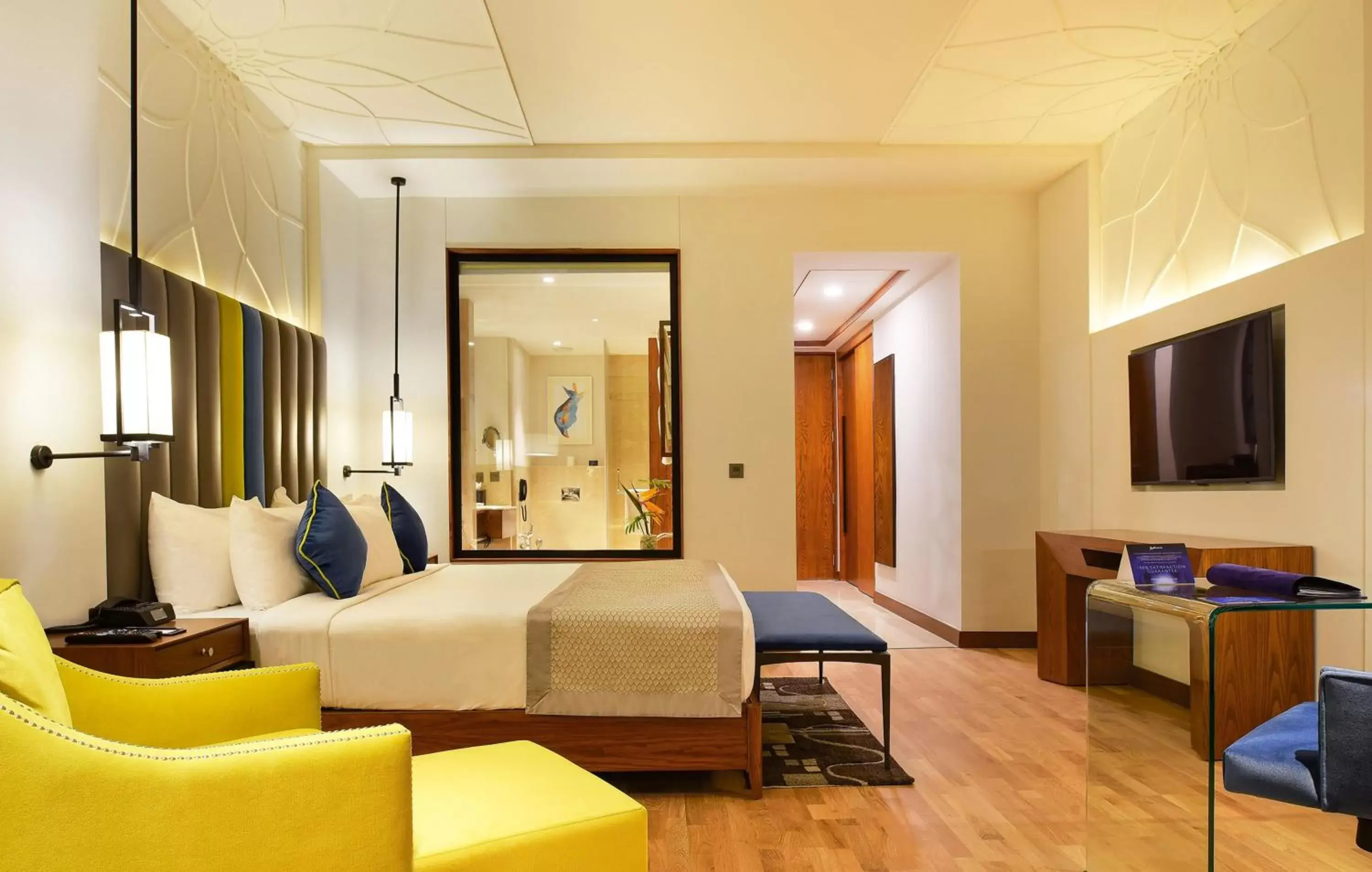 Bedroom, TV/Entertainment Center in Radisson Blu Plaza Hotel Mysore