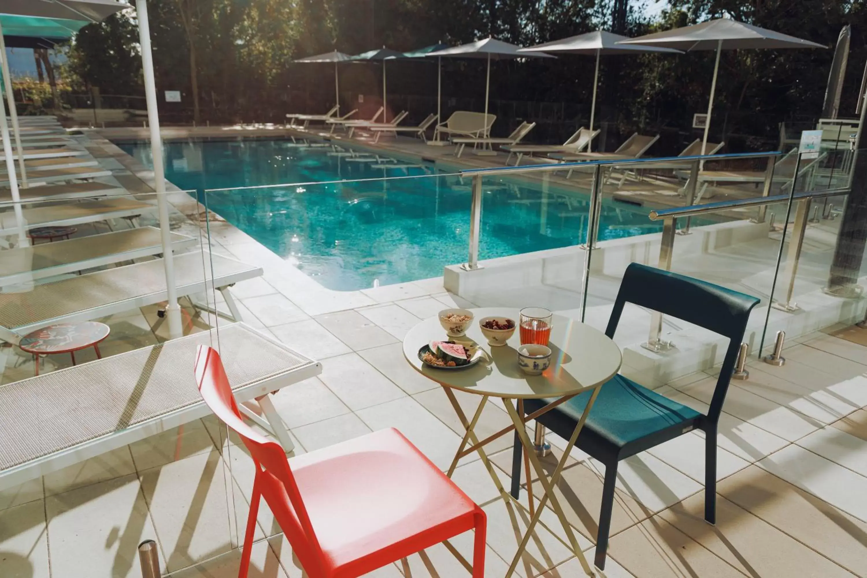 Patio, Swimming Pool in ibis Budget La Rochelle Centre