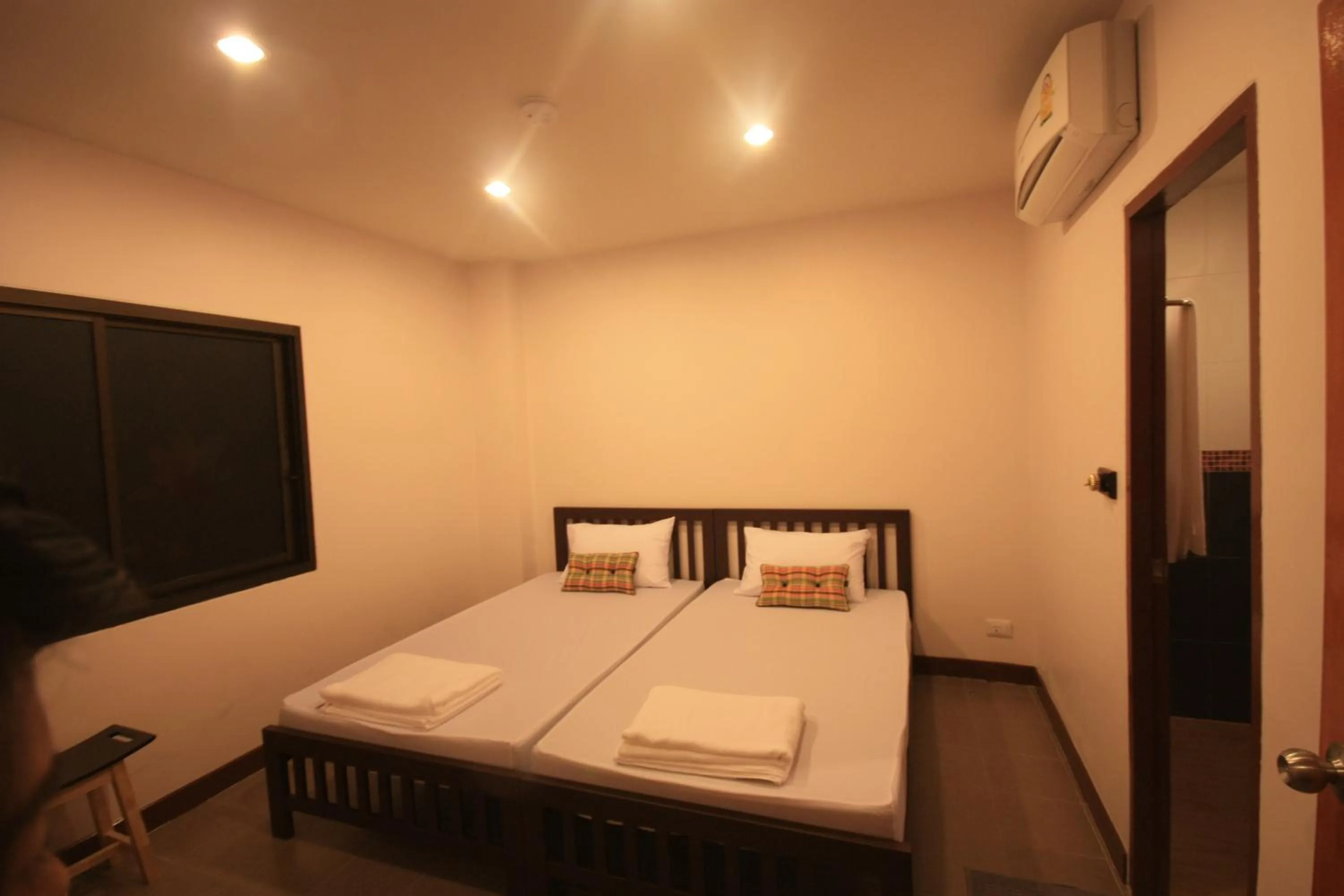 Photo of the whole room, Bed in Ming Shou Boutique House